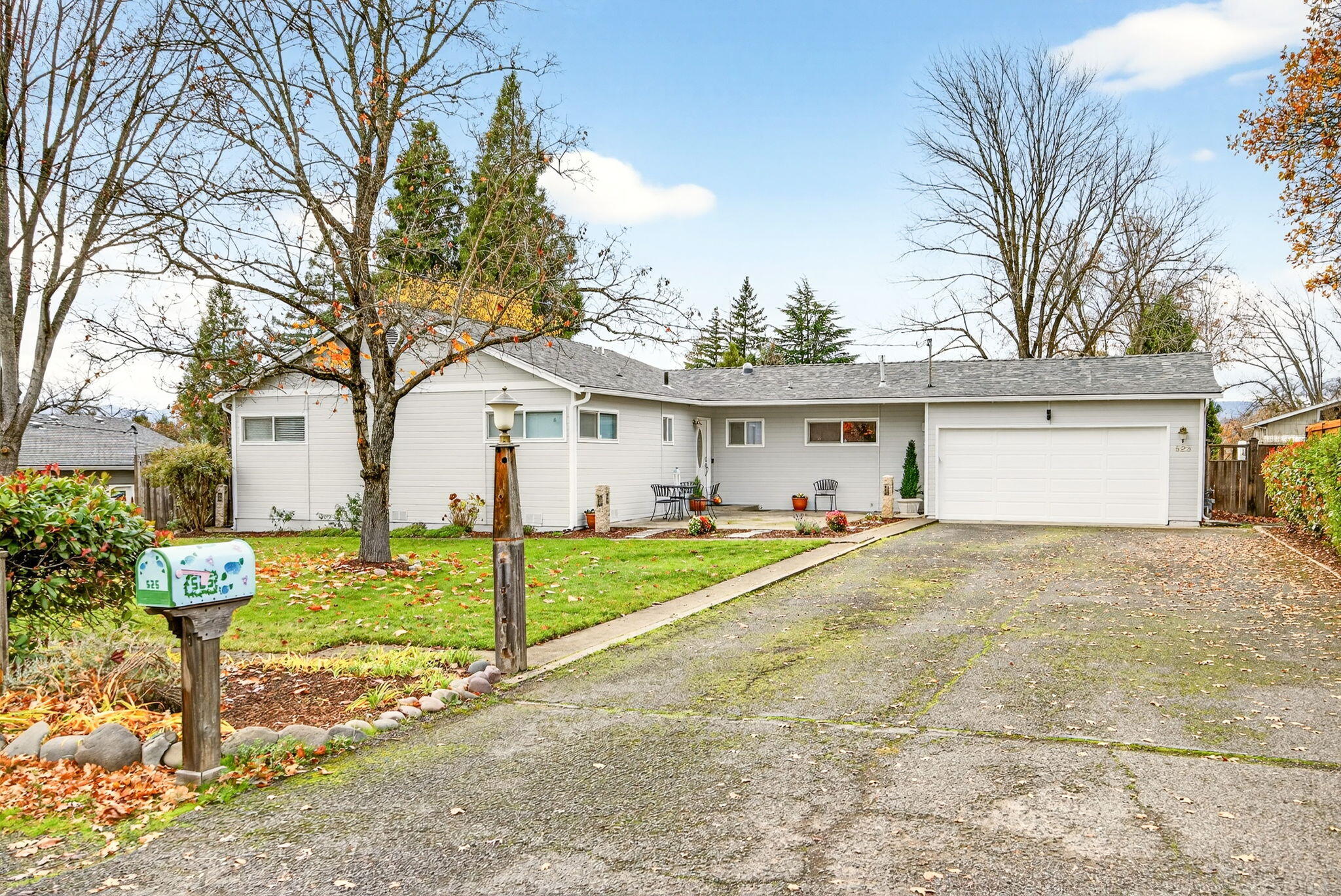 Lovely home on a dead-end street in the beautiful Eastwood subdivision. Big ticket items already replaced! New roof in 2018, new heating and air system in 2021, and new septic line from clean out to city hook-up in 2020. This roomy home has lots of options! The spacious living room has a gas fireplace and is open to the kitchen, great for entertaining. The kitchen has a cute area for a coffee/drink bar display; lighting from a solar tube and the fridge is included. Large area for dining table in the kitchen. There is a wonderful bonus room through the barn door. It has been used in the past as a primary bedroom and as a family room. Enjoy the custom storage bench, closet and a cozy woodstove. The bedrooms have pretty hardwood flooring and nice natural light.  Out in the backyard there is a large deck for entertaining, a huge yard and a workshop/shed. Lots of parking in the driveway too! Enjoy the outdoor night lighting in the driveway as well. Wonderful home on a gorgeous lot!