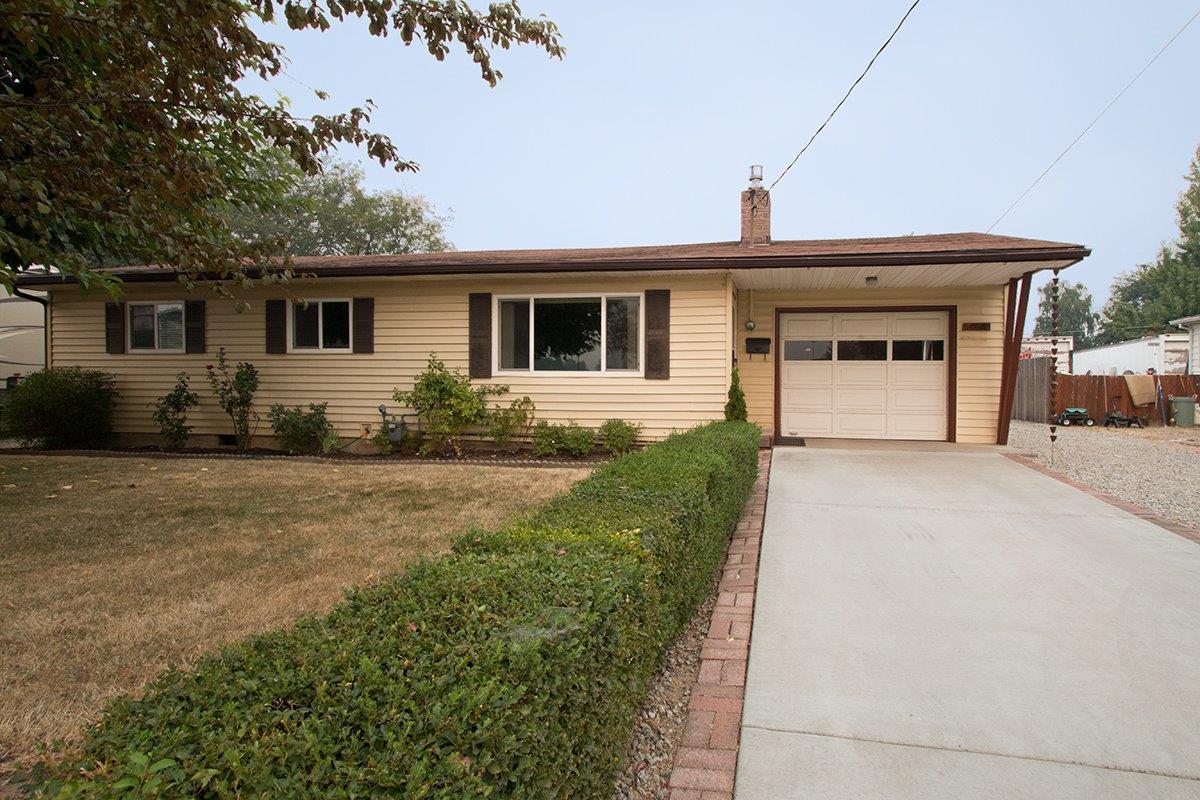 Come see this charming Central Point home conveniently located between the grade school and middle school, and near Crater High School. This two bedroom home with it's large living room could easily be converted back to its original 3 bedroom floor plan. Fenced back yard, shaded front yard and RV parking! All appliances are included: Refrigerator, Range, Dishwasher, Washer, Dryer. Affordable and move in ready!