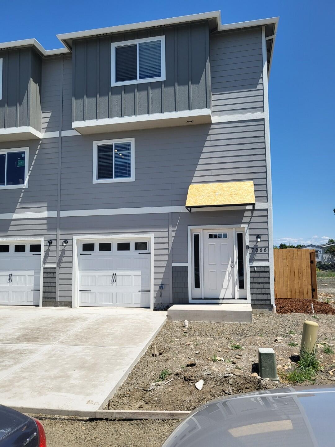 Come to White City, we are growing again! Welcome to one of the newest neighborhoods in the area. Still Some of the most affordable new homes in the Valley! These 3 story Townhomes will impress. Seller to pay up to $10,000 toward Buyer closing costs & Prepaids. (Subject to loan restrictions.) Granite Kitchen plus Stainless Refrig., Range/oven, Micro & Dishwasher included. Featuring Great room style Living Area on 2nd floor. Primary bedroom plus private bath and closet, plus 2nd Bedroom with its on bath on 3rd floor. 3rd bedroom/office located on ground level. Ductless Heat pump. Finished garage. Seller will provide 2-10 Warranty. HOA is inactive. Too much good stuff. Contact us for a tour as we build these beautiful Homes!