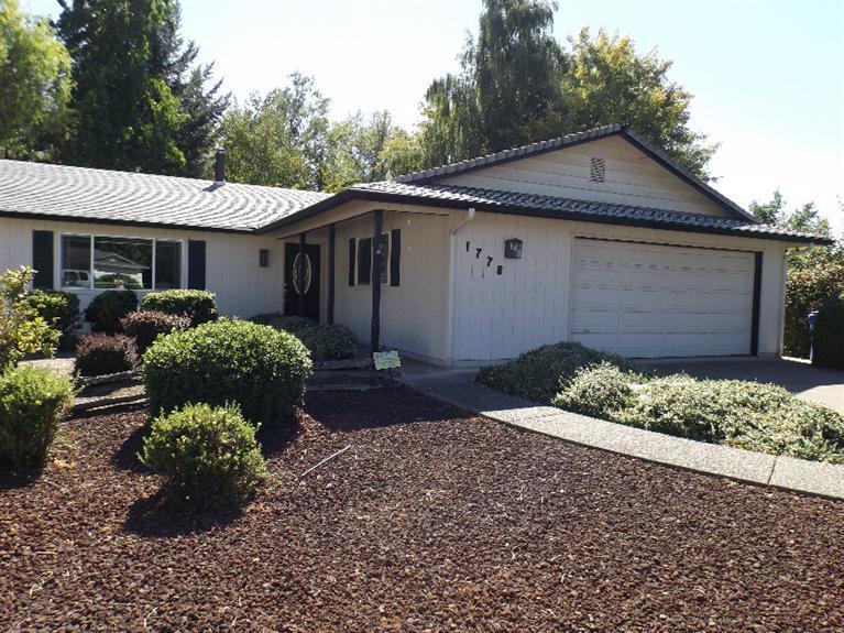 Don't let the age fool you! This beautiful one owner house is ready for you to call home. This property has been impeccably cared for and has received recent upgrades,new thermo-pane windows throughout, new hot water heater, and the kitchen has granite counter tops to enhance the beauty. Lovely dining area opens up to a beautiful covered deck overlooking serene back yard with water feature. Three nice sized bedrooms, hall cupboard, bathrooms with tile, laundry room with additional cupboards. There is also a shop with electric that can make any project a pleasure to work on. Sprinkler system is manual not automated.