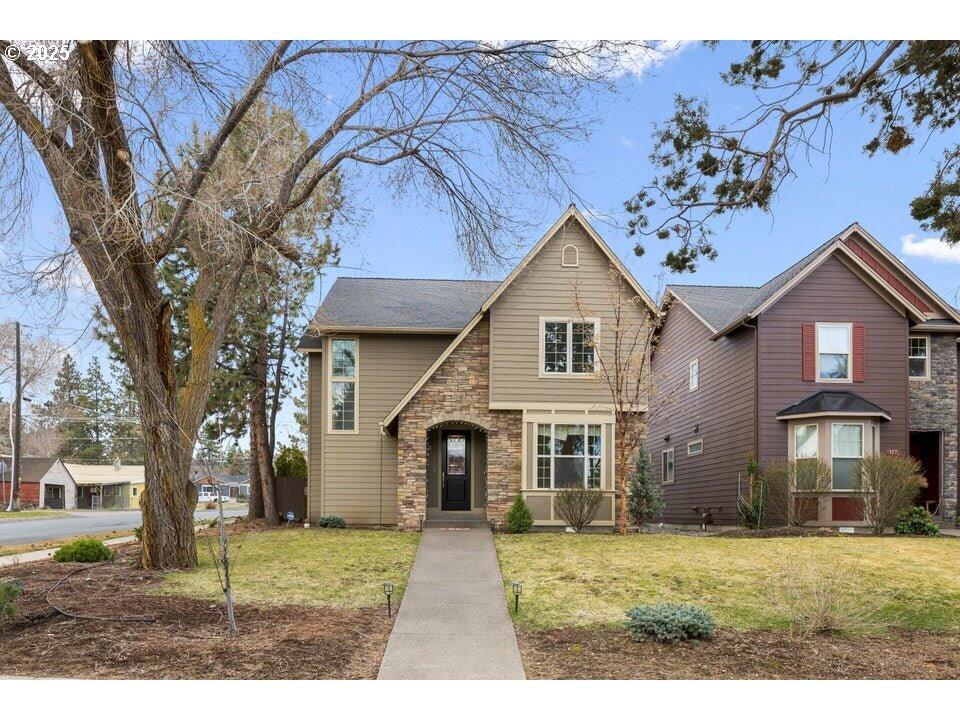 This beautiful home is located within walking distance to the Old Mill and the Deschutes River.  Enjoy everything Bend has to offer!  A spacious floor plan offers extremely functional living space with 3 bedrooms and 3 bathrooms.  It features newly refinished hardwood floors and carpet.  A gas fireplace lights up the living room.  A separate downstairs office is situated just off the kitchen and living area.  The kitchen has bright wood cabinetry, Corian hard surface countertops, a full tile backsplash, gas range and stainless steel appliances including refrigerator.  The laundry room is located just off the kitchen and dining area.  Upstairs the bedrooms sit alongside the cozy loft, perfect for a ready nook or a desk.  The upstairs bathroom offers cabinetry and a separate toilet and shower area.  The master bathroom offers two sinks, a soaking tub, separate toilet and walk in shower.  Enjoy easy access to the fully fenced backyard from the dining area for grilling and relaxation.