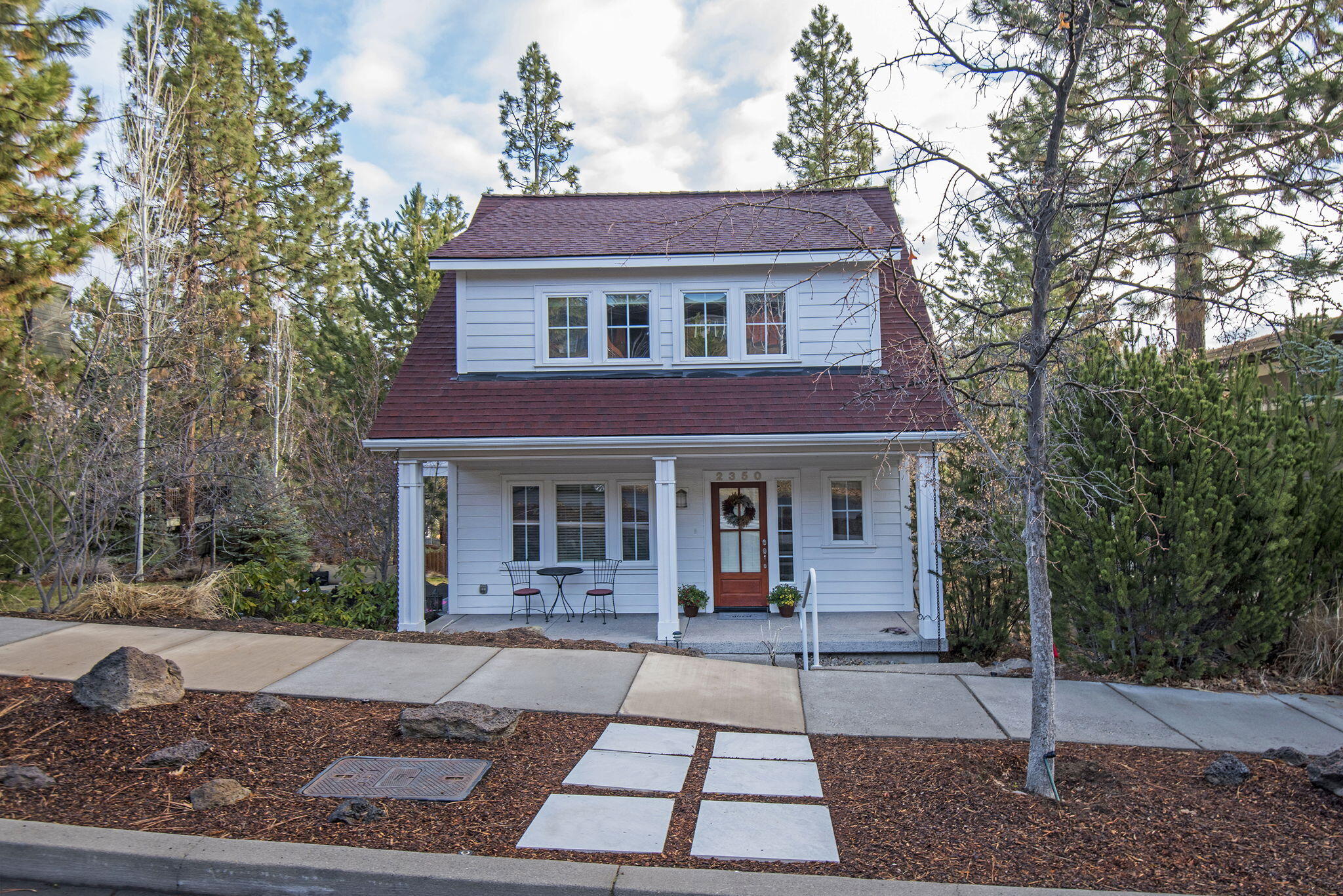 In the highly sought-after neighborhood of NorthWest Crossing, this Greg Welch-built light-filled home has so much to offer! Situated just 0.7 miles from the popular Sparrow Bakery, and 1.2 miles from the Victorian Café, this location can't be beat! This beautiful home is full of natural light and a spacious kitchen with new stainless steel appliances, a large butcher-block island and dining area that opens to an outdoor patio area. A generous living room with built-ins and a stately gas fireplace make this home perfect for entertaining. You will have plenty of space with an office/den & a bonus space upstairs with balcony-access. The large primary bedroom with ensuite bathroom offers a soaking tub, dual vanity, tiled shower and walk-in closet. Recent updates include a new gas furnace, A/C, & the main-level side deck planking which was replaced 2 years ago. This property includes a darkroom/artist studio off of the garage & subterranean storage closets perfect for wine storage.