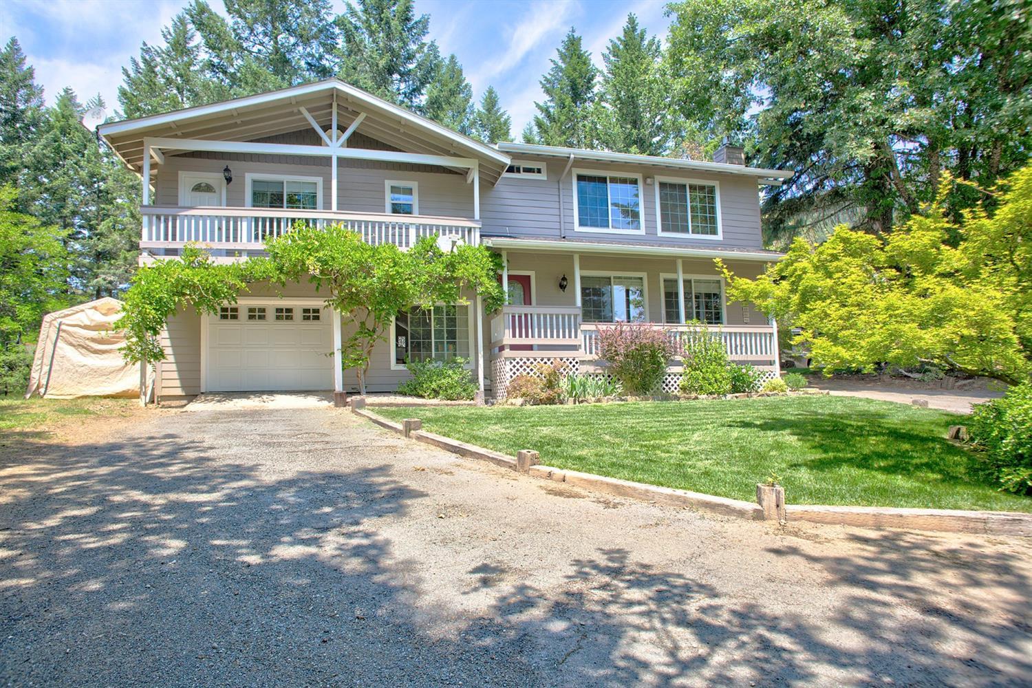 Back on the Market! No fault of the home or property. Family Home in Wine Country! Private wooded acreage in the beautiful Applegate Valley. With a gated entry, this 4 bedroom 2.5 bath, 2374 sq ft home offers peace and tranquility on its 5.15 acres. Enjoy view of the surrounding mountains, sipping your morning coffee, listening to the sounds of your water feature and the birds from your covered back patio. With ample parking, there is space for all your toys, RV, and more! If you love to entertain, you will love this lay out. Kitchen, dining room and formal living room are on the main level, with 4 bedrooms office, and family room on second level. Come see what this home has to offer today! All information is deemed reliable but not verified, anyone considering purchasing this property purchasing this property should perform their own investigation into the uses and conditions of property.