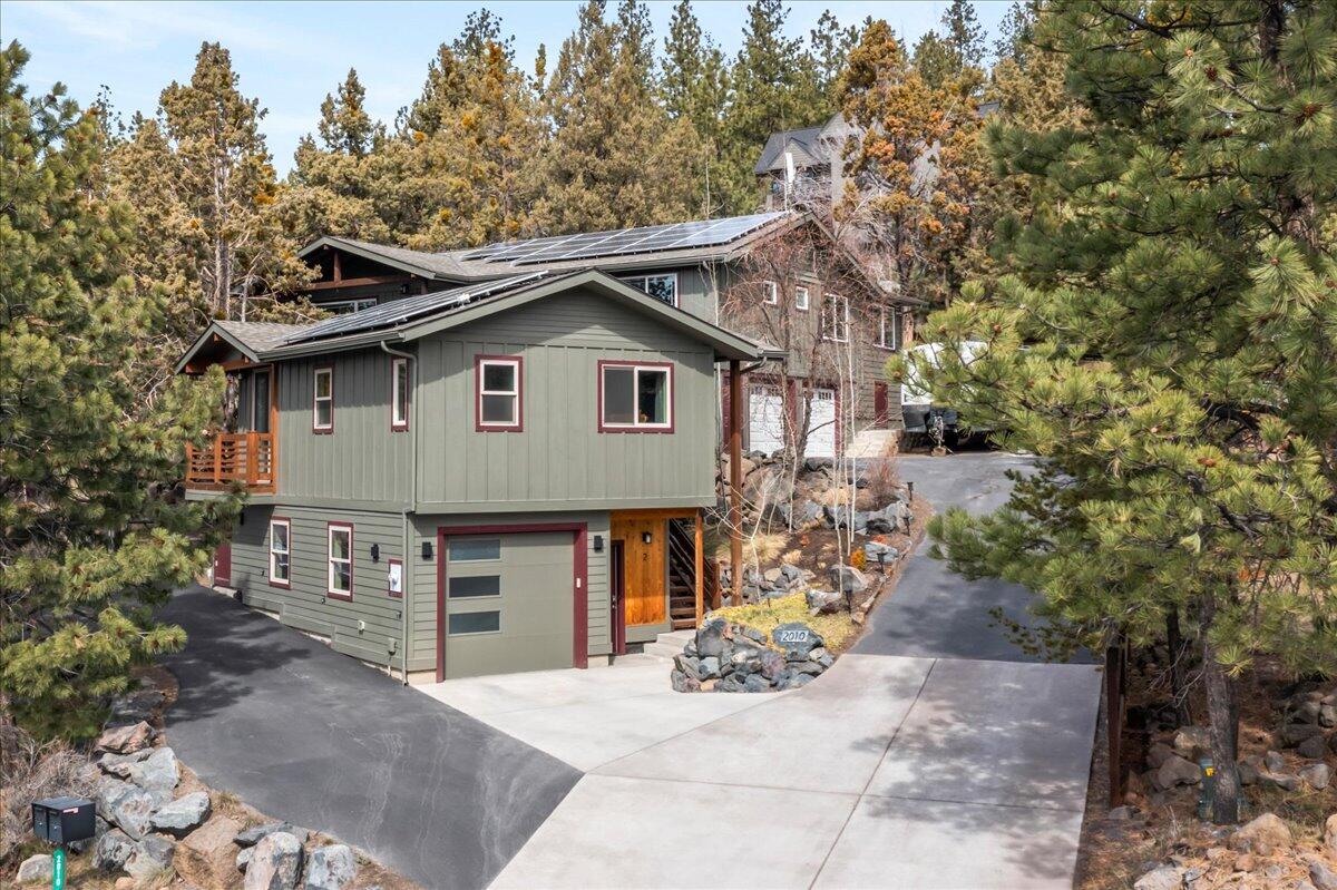 A one of a kind West Hills Beauty. Welcome to this fully remodeled single family home with a 2015 permitted ADU with a garage, w/d and additional storage. The main home has a total of 2508 sq. feet including a downstairs mother in law quarters with an outside access. 

The main floor features a concrete dining table with heated marble inlay, 6 burner stove and all stainless appliances. Plus a remote controlled skylight with rain sensor in the kitchen. Solid maple cabinet with slow close drawers. 

The ADU has its own garage & parking space, extra storage and access to washer/dryer. A mini-split provides heat & cooling.

The private .31 acre corner lot offers territorial and view of Mt. Bachelor from many areas. A private fenced yard ha sprinklers, trex decking and a paver patio. A small garden shed sits to one side. 

Solar panels provide the electricity for the entire property at $21 per month. There is onsite parking for multiple cars and a RV.