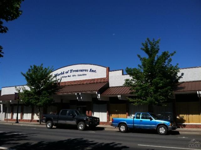 Located in the heart of downtown Madras, this solid, well-maintained building has a street level of almost 10,000 sq ft, and a basement of equal size. In addition, the listed price includes 25% interest in a 20,000 sq ft improved parking lot behind the building. Wide variety of uses possible with this spacious building. Currently rented to a church which creates a tax exempt status. Motivated seller and all reasonable offers will be considered.