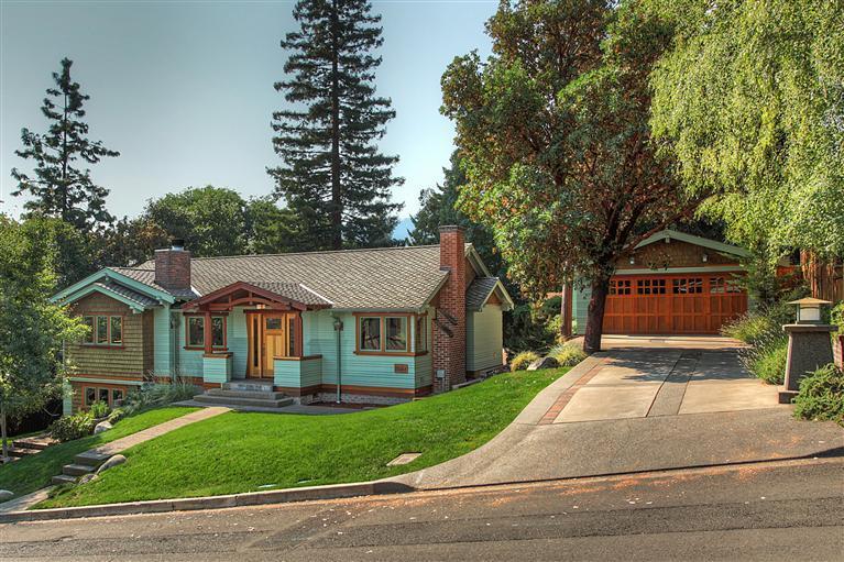Location! This Period style residence is located in one of Ashland' Historic Districts, near downtown. The Main House has 3 beds, 3.5 Baths, formal & informal dining, a cozy living rm, Wine Cellar & Media Rm. An additional 633 Sq Ft in the detached cottage w/ full bathroom, wet bar & its own laundry. Magnificent attention to detail throughout. The home boast Brazilian Cherry Flooring, Fir detailing, recessed lighting & Sierra Pacific windows to capture all the amazing natural light. Large open kitchen is a Chef's delight. Granite Counters, an over-sized Farm sink, Breathtaking Fir & American Cherry Cabinets, Double Oven 6 burner Wolf Range, Large Island & 2 dishwashers. Well appointed main level Master w/ separate seating area, teak flooring, a True Spa-Like bath including walk in shower, soaking tub, Honed travertine floors, marble countertop & 2 separate closets. The Paver Patio offers plenty space for outdoor entertaining. Ample parking w/ a 2 car garage + an addition 1 car/shop are