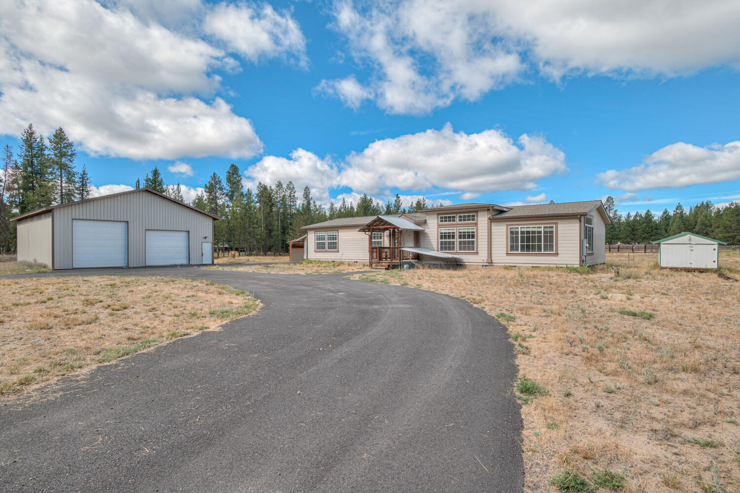 Tucked away on a peaceful 1.36-acre lot, this inviting La Pine property offers the perfect blend of space, comfort, and country charm. Step inside to soaring vaulted ceilings and a spacious, open-concept layout that feels both airy and warm. The heart of the home is the oversized kitchen - designed for cooking, gathering, and memory-making. You'll love this generous island with a breakfast bar, ample counter space, an abundance of storage, and a walk-in pantry that keeps everything organized and within reach. Whether you're entertaining friends, hosting the holidays, or simply enjoying a quiet night in, this home checks all the boxes for functionality and comfort. 
Outside, the expansive 1.36-acre lot gives you room to breathe, garden, play, or dream up future plans-RV parking, shop space, you name it. Don't miss your chance to own a slice of Central Oregon serenity, just minutes from La Pine's conveniences and endless outdoor adventure.