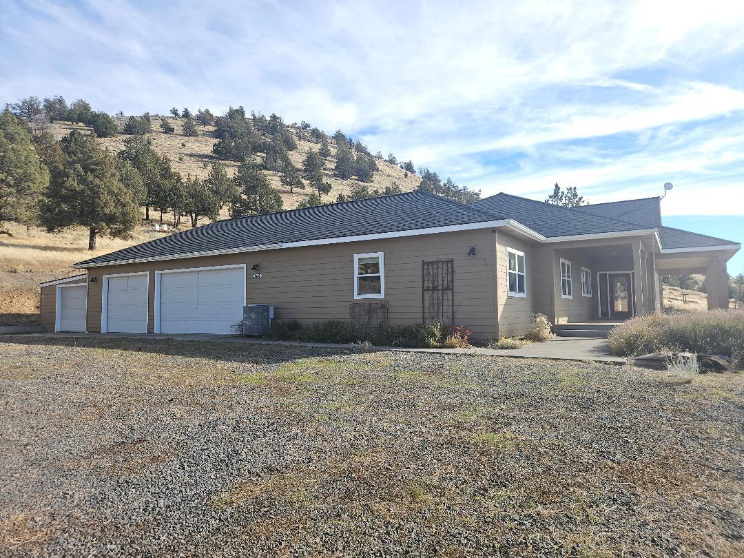 Discover true tranquility in this stunning 2,547 square foot home, perfectly positioned on 8.15 acres to maximize its breathtaking, panoramic views. 3 Bedrooms, 3 bathrooms, office and a dining area. Nice open Floor Plan with vaulted ceilings. Luxurious primary suite with a jetted tub and a walk-in shower. Enjoy the views from your front deck and patio. Attached 4 car garage. It has a greenhouse, and a charming chicken coop!