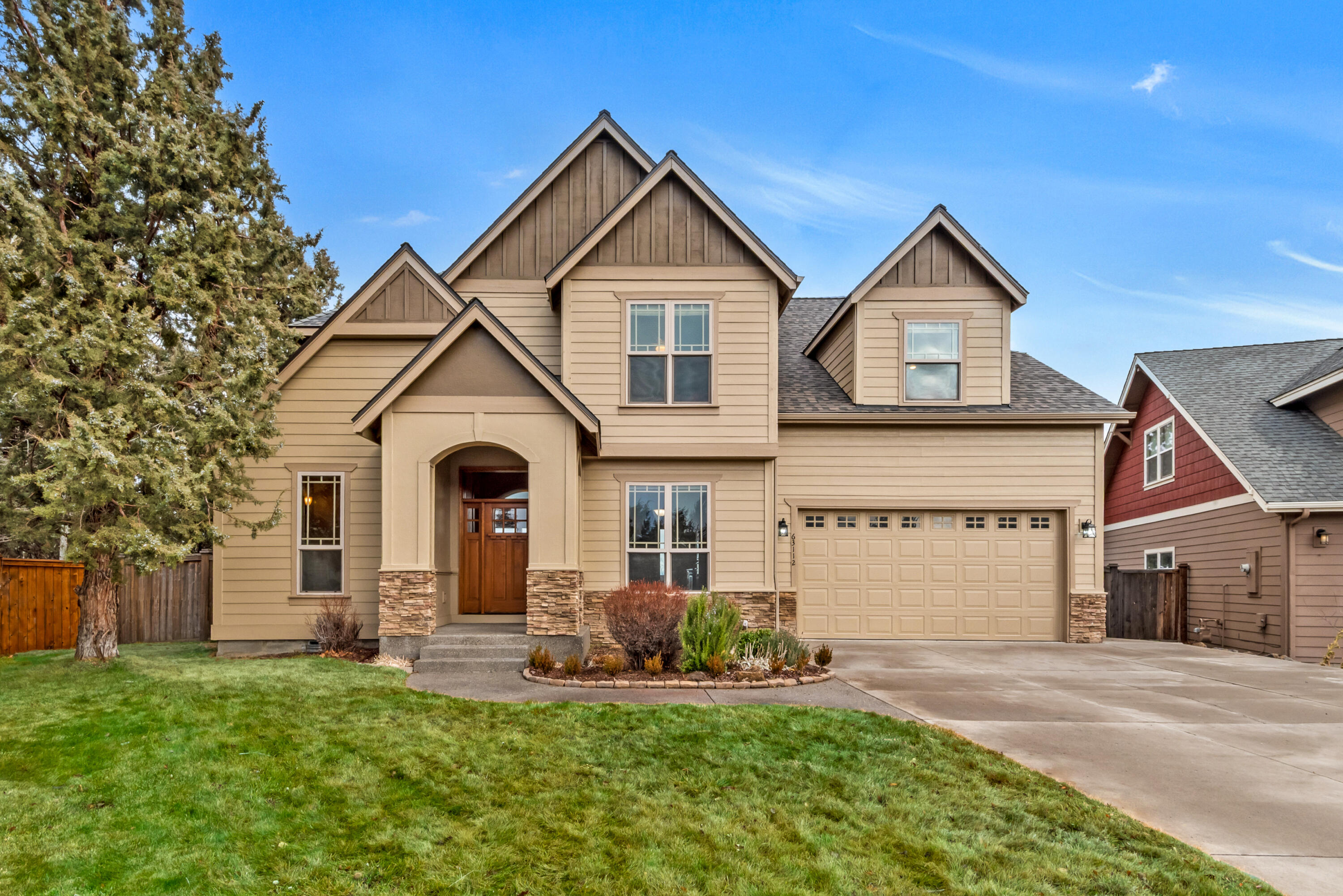 Located on a quiet cul-de-sac in an established neighborhood near parks, schools and shopping, this warm and inviting home has design touches and upgrades including wood trim and custom cabinetry, designer floors, granite counters, new interior paint throughout and a new 30-year roof. A covered front entry leads to a well-planned main level with a great room featuring large windows and a gas fireplace, open kitchen with bar seating at the island, a dining room with arched doorways and a study with French doors. Upstairs, there are Cascade Mountain views, a primary suite with a slate walk-in shower, two additional bedrooms, another full bath and a large bonus room or 4th bedroom. The 2-car+ tandem garage has room for hobbies and storing outdoor gear, and the fenced backyard has a deck accessed by the great room. Featuring timeless architecture and charm, this home provides easy access to the Bend Parkway, Pine Nursery Park and Downtown Bend.