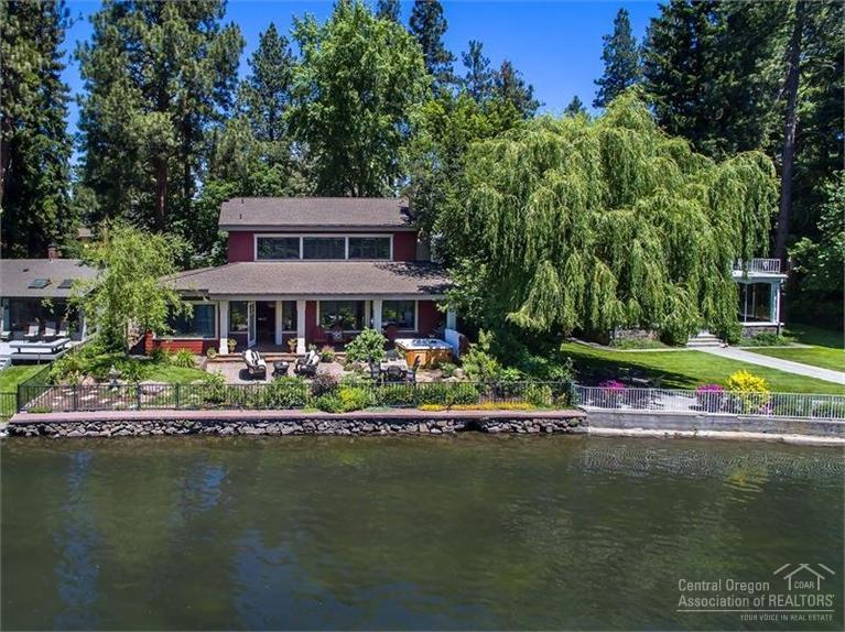 Imagine a place you've only dreamed about! This amazing home on Mirror Pond was completely re-built in 2005 w/the highest quality finishes possible. The great room floor plan features crown molding, wonderful columns & plenty of windows to capture a view you have to see to believe. The expansive backyard w/the water glistening inches away lets you breathe in sights & sounds of the most beautiful scene in Central Oregon.