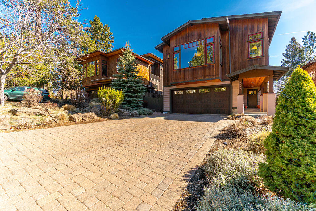This craftsman style home is located in prime Northwest Bend minutes from the Deschutes River and all that Westside Bend has to offer.
Upon entering the home, you will be greeted by grand tall ceilings and real wood flooring. There is a loft/office area located on the 3rd floor.
The private master suite features a gas fireplace, large walk in closet, tile shower, double vanity and soaking tub. With over 2818 SF, this
home offers solid core stained doors and trim throughout, stunning kitchen cabinetry, a New LG smart fridge, 6 Burner 48 inch Viking
Range and Range hood, Built in cabinetry in the living room, many large windows that bring in tons of natural light, two 2nd story patios,
lots of storage, New Garage Door, New Heat Pump, AC, Central Vacuum System, oversized water tank and a Laundry Chute. The exterior was masterfully
crafted with the stunning wood accent wall on the front of the house! There is a 3 car garage and a large brick driveway that can fit up to 4
cars or an RV.