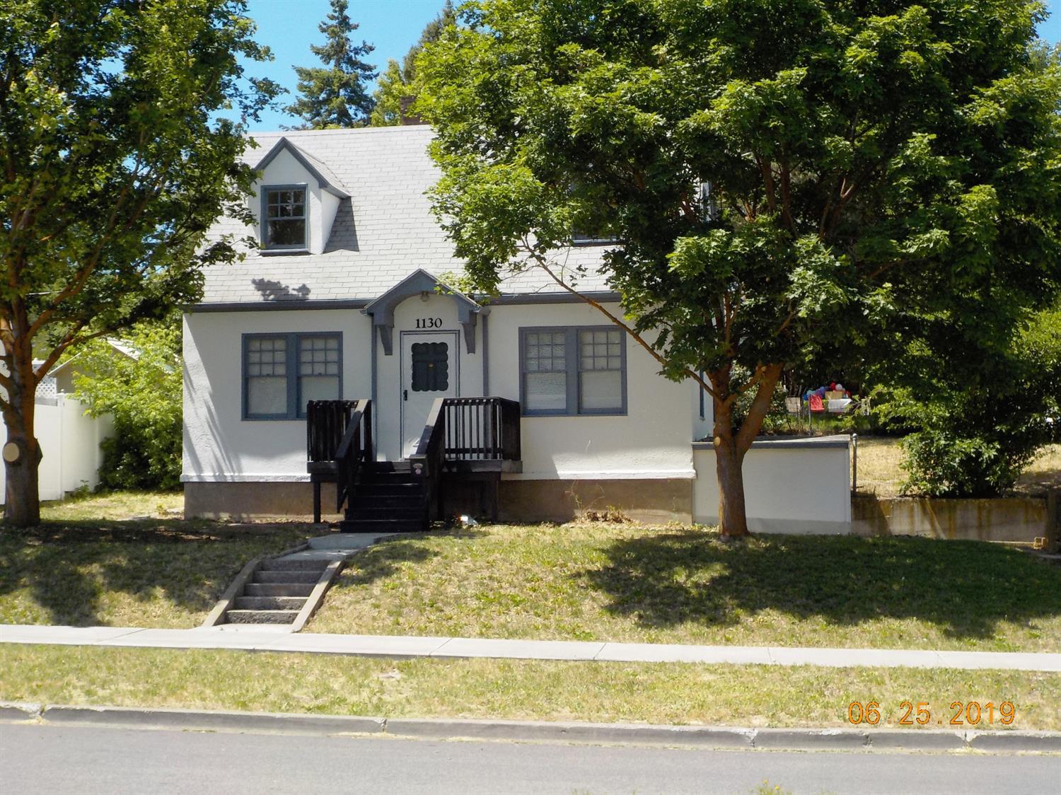 Charming home with lots of character. Beautiful wood floors, new carpet, some new interior paint and all new exterior paint . Private covered deck. Great floor plan featuring a large living room. Basement is not included in square footage and it features the third bedroom and 2nd bath.
