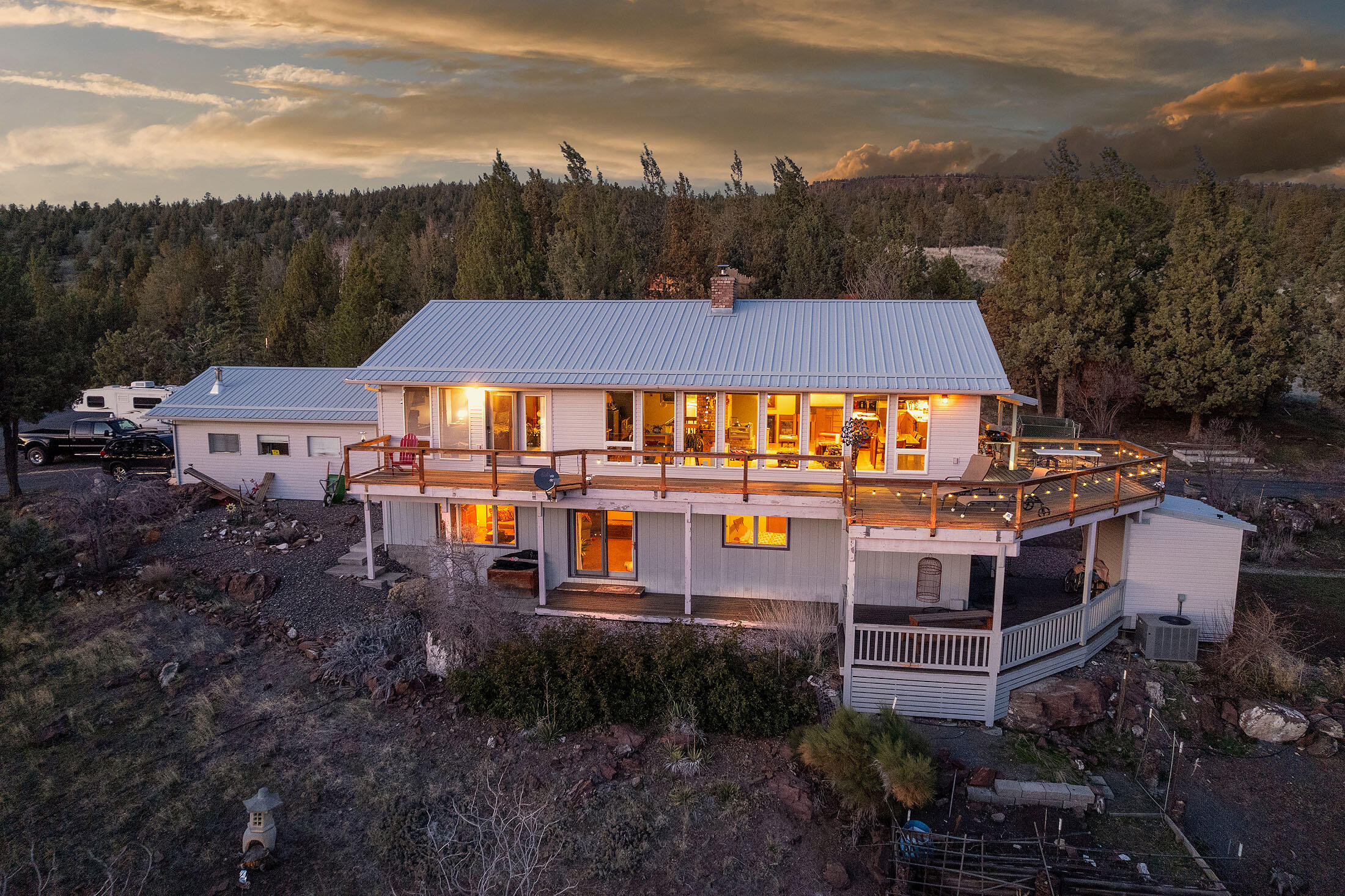 Love a spectacular View! An exciting place to live from stunning sunrises bringing the Cascade Mountains to life each morning, storms crossing the valley below and enjoying your evenings on the lg open deck viewing crimson sunsets. Perched on a knoll of Sunset Hills a perfect setting to entertain from the extensive decks. Spacious, 3000 Sq Ft, 3 bedroom, 2.5 bath home built in 1986 with 2 bonus areas for additional bedroom or option for generational living on lower level. Open floor plan, Kitchen w/oak cabinetry, lg island, pantry, all appliances included, vaulted knotty pine ceilings w/access to open decks. L/R & DR ample natural light & amazing views. Master on main, walk in closet, Jacuzzi tub, shower stall & access to exterior deck. Lower level w/family rm, brick surround w/pellet stove, 2 bdrms, bath, 2 bonus rms. Det single garage plus storage shed and minimal outside upkeep. Circular paved driveway w/ covered carport and RV parking.