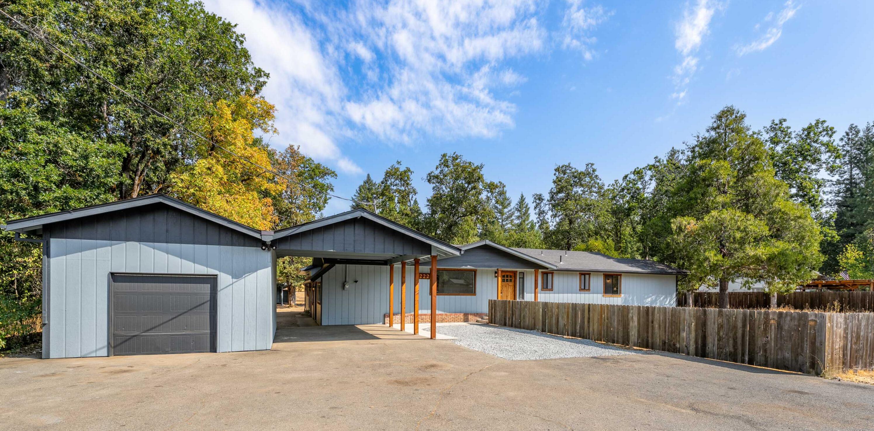 Beautifully remodeled three bedroom two bath home situated on over an acre! Featuring a brand new roof on both the home and all the outbuildings, while nicely trimmed wood windows and a Craftsman style door with brick accents, add timeless curb appeal. Inside, enjoy new appliances, updated cabinetry, finished with chopping block countertop. New bathrooms completely remodeled and interior and exterior
paint. The huge fenced yard perfect for pets gardening or entertaining just waiting for your special touches.