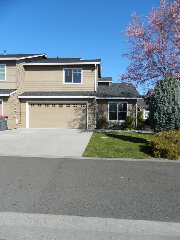 Well developed area. 1230 sqft Two master suites. 3 bedroom 2 1/2 baths. The living room is open to the kitchen. Easy to maintain. Two car garage. This home is vacant and ready to move in.