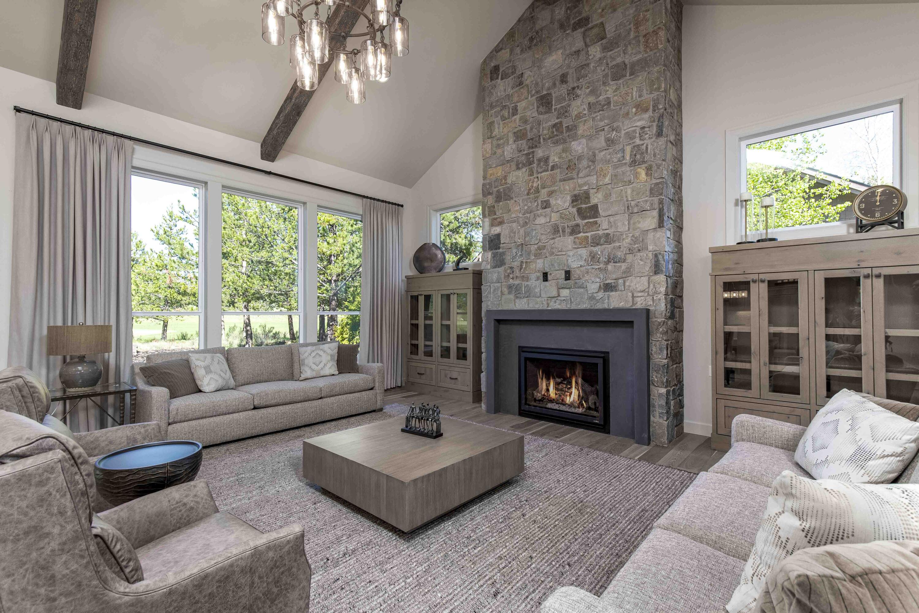 Experience luxurious living in this stunning NW style home in Caldera Springs that boasts a prime golf course frontage and views of Mt Bachelor. This serene property provides the perfect escape from the hustle and bustle of everyday life. With ample gathering spaces, perfect for full time living or a vacation escape. The main level features three spacious on-suite bedrooms, a great room, a gourmet kitchen, a dining area, a laundry/mudroom, a powder bath, and an expansive covered paver patio that's perfect for entertaining. Upstairs, you'll find two more luxurious on-suite bedrooms, as well as a recreation/bunk room that's perfect for kids or guests. This home is beautifully appointed with distressed wood beams, custom cabinetry, rich woods, solid surfaces, designer tile, high-end appliances, and two-zoned central A/C. Now sold furnished, this home is move-in ready.