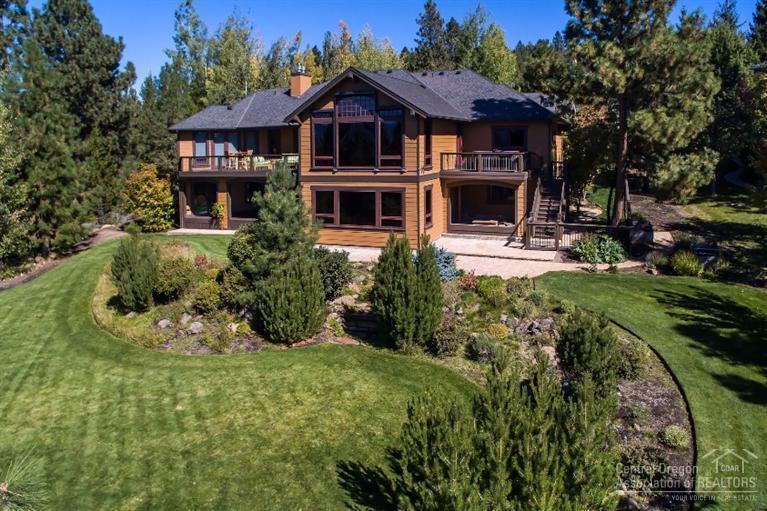 Fabulous high quality home w/full on Cascade Mtn views! Gourmet kitchen features solid slab granite counter tops, island, SS appliances, Viking cooktop-4 burner w/griddle, Sub Zero, dbl Viking ovens, Viking wine refrig. & loads of cabinets. Vaulted LR w/exposed beams & FP w/blt-ins on either side. FR features floor to ceiling windows, FP & blt-ins. Luxurious master w/FP, French doors, slab granite counters, tile floors & stand alone tub. Guest ste upstairs, 2nd master down along w/kitchen & addit. FR.