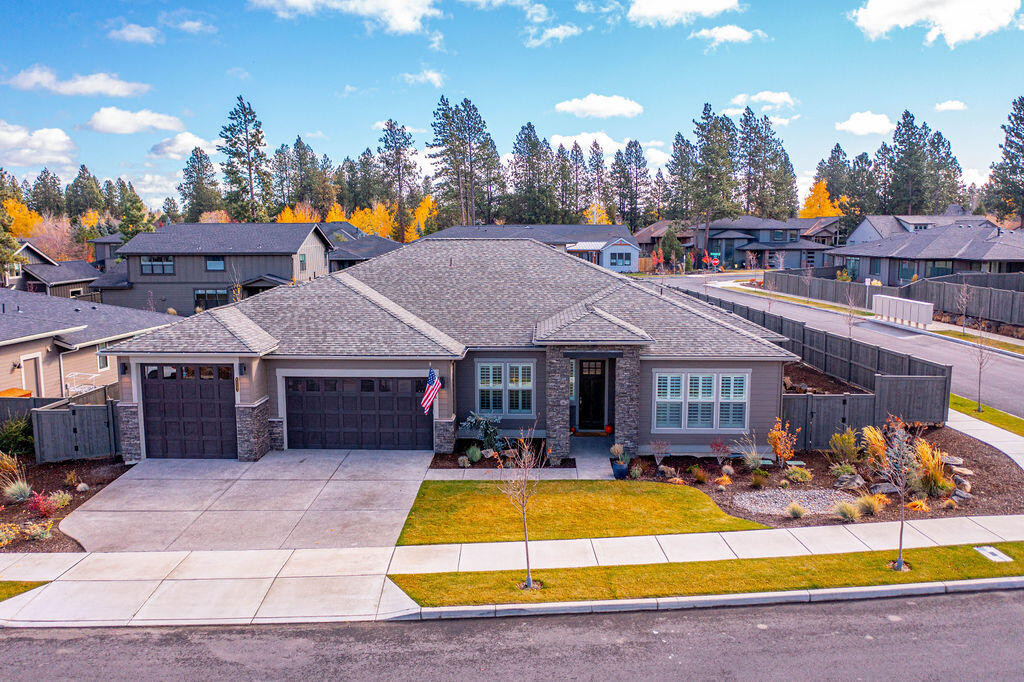 A wonderful single level home in the sought-after neighborhood of River Vale. Situated on a large corner lot, this sprawling floorplan features tall, coffered ceilings with crown molding, a formal dining area, built-ins, a bonus room and an office. The oversized garage features a third bay with a taller garage door to accommodate a boat or trailer. The master suite is separated from the remaining bedrooms and has a free-standing soaking tub and a large walk-in closet. Bachelor views can be seen from the front bedroom and from the elevated back yard. One of Bend's newest neighborhoods, River Vale is located in close proximity to the Deschutes River, Brookswood Plaza, Sunset Hill, and Elk Meadow elementary school.