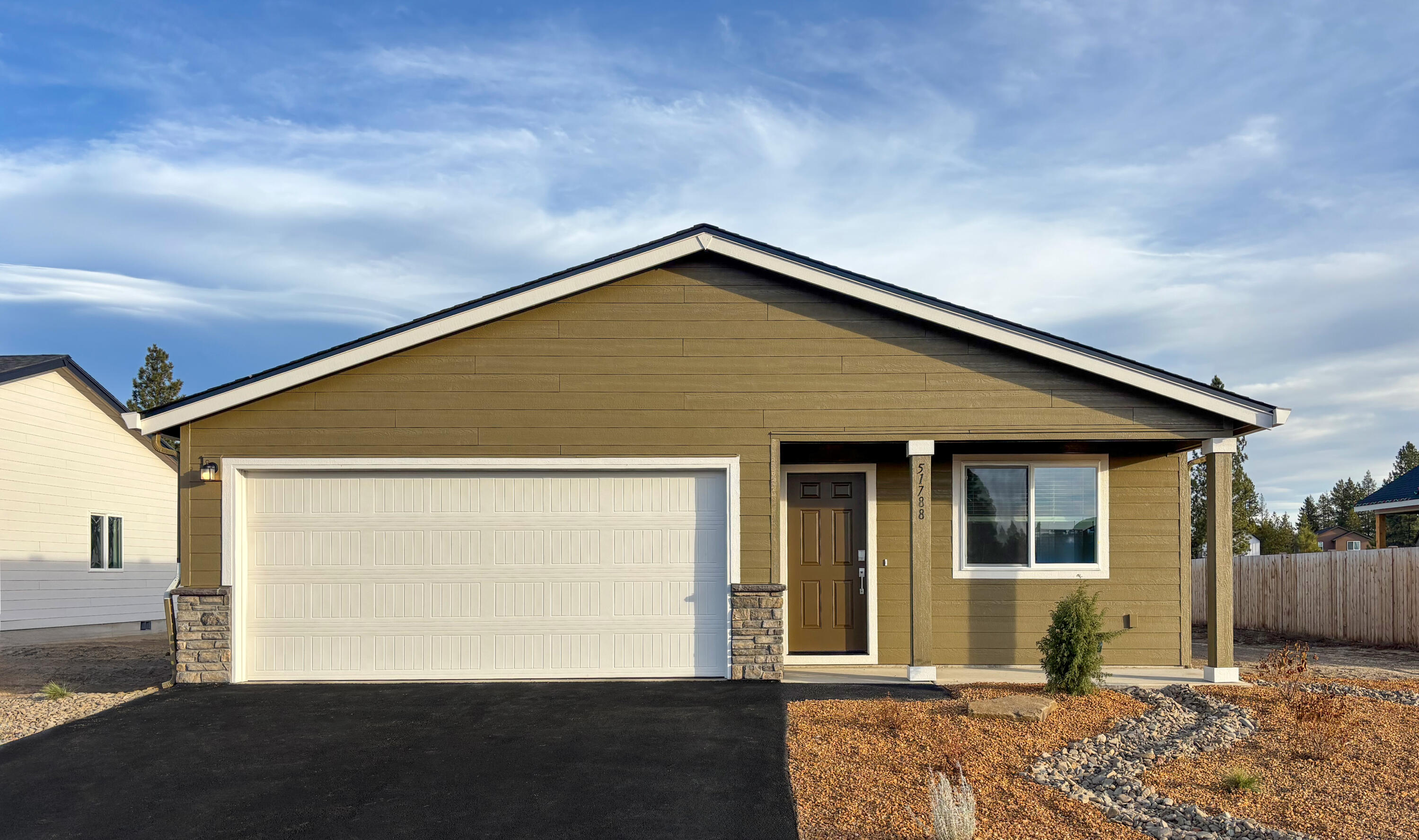 This new construction home is Move-In-Ready! Located at beautiful Reserve in the Pines. The Ontario plan features a single-level, open-concept layout with a kitchen, dining area, and great room flowing seamlessly together. A bedroom near the entry provides convenience, while two additional bedrooms, including the luxurious primary suite with a spa-inspired bathroom and walk-in closet, are tucked to the side for added privacy. Interior highlights include quartz countertops, shaker-style cabinetry, and LVP flooring in the kitchen and bathrooms. This home also includes central AC, a refrigerator, washer and dryer, a xeriscaped front yard with a drip irrigation system, and blinds—all at no extra cost! Homesite #139.  Rendering is artist conception only. Photos are of a similar home, features and finishes will vary.