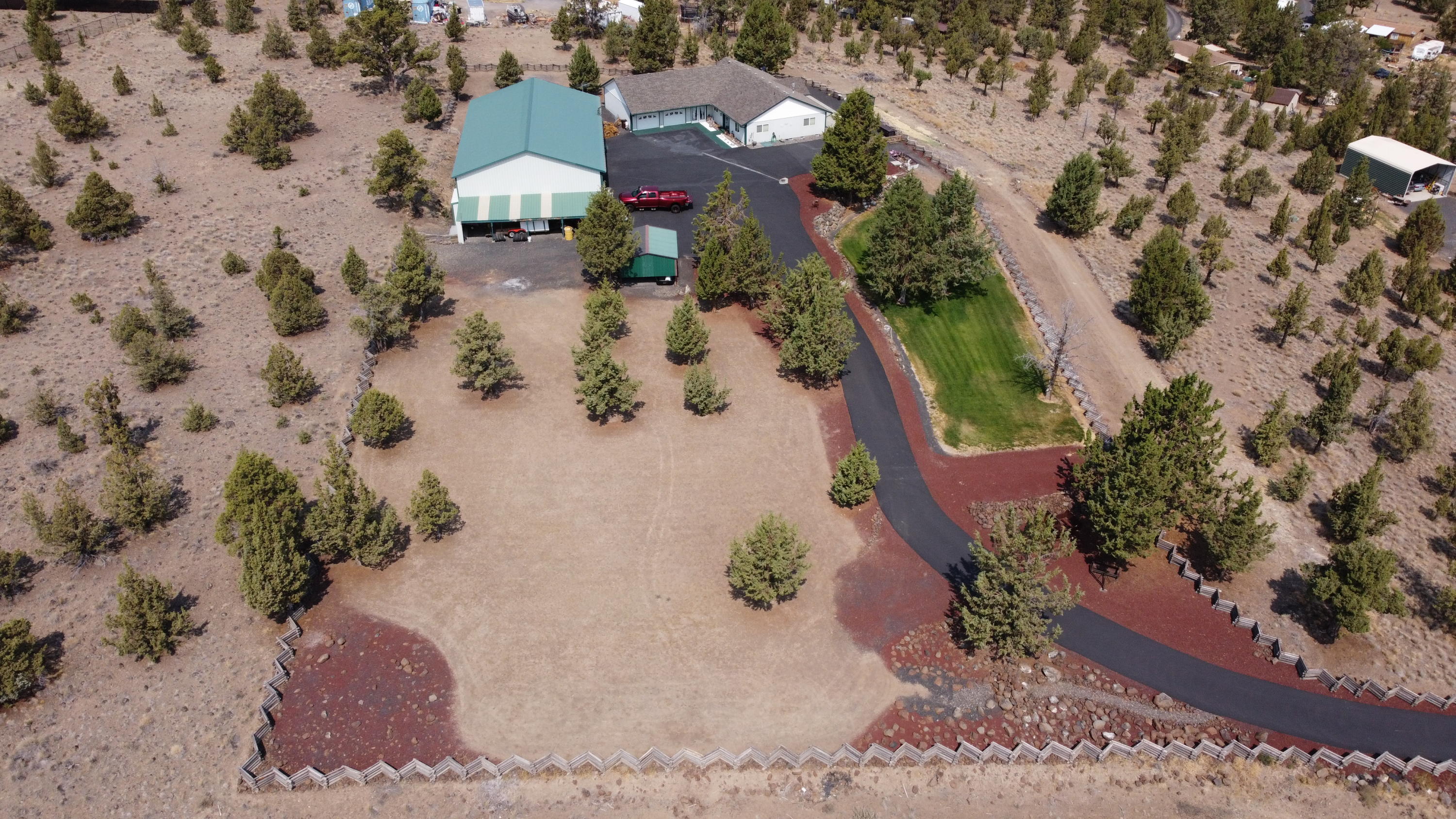 Enjoy the Ochoco Mountain and Prineville Valley views from almost any room of this very well maintained 1650 sf home. There's also a patio off the back of the home where you can soak in the scenery. This 3 bedroom 2 bathroom home is situated on 3.72 acres in the Highlands Subdivision at the end of a quite cul-de-sac. The home also boasts an over sized (992 sf) 2 car garage with plenty of built in storage. In addition to the over sized garage there is a 4 Bay (1 RV Bay Door) 3053 sf partially insulated shop with a half bathroom, loft area and wood stove. The grounds include 1 full RV hookup and 2 additional RV spaces with power only. There's also 12,000 sf of asphalt between the house/garage and shop area with an asphalt driveway from the cul-de-sac. Grab your favorite Real Estate Agent and schedule a viewing today.