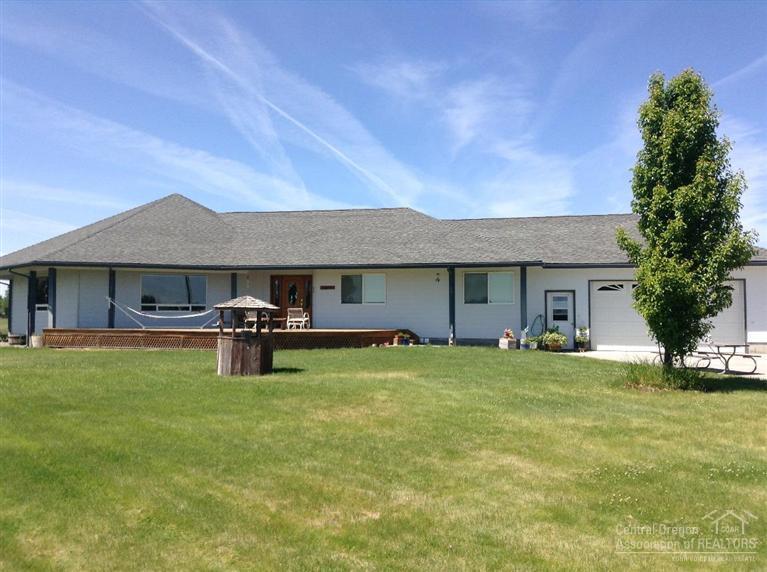 This beautiful single level builder's home on small acreage is centrally located in Tumalo. A great room style home with a large kitchen, lots of windows, comfortable master suite, good bedroom separation and Mtn. views. Wonderful landscaping and 4 acres of irrigation. Less than mile to the Deschutes River and many hiking trails.