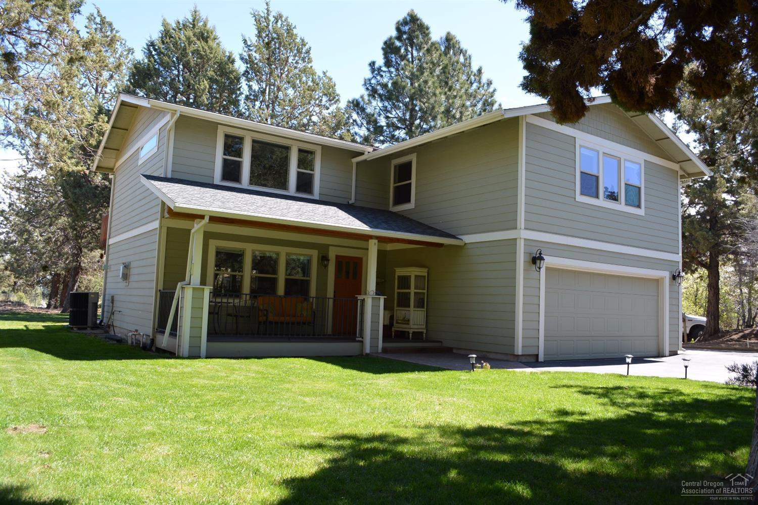 Wonderful small acreage property close in, popular neighborhood. This property has it all! Bring your critters or toys. 30x32 heated shop with 10' doors, utility garage/shop. Metal building currently set up for horses, pasture, small fruit tree orchard - a must see!