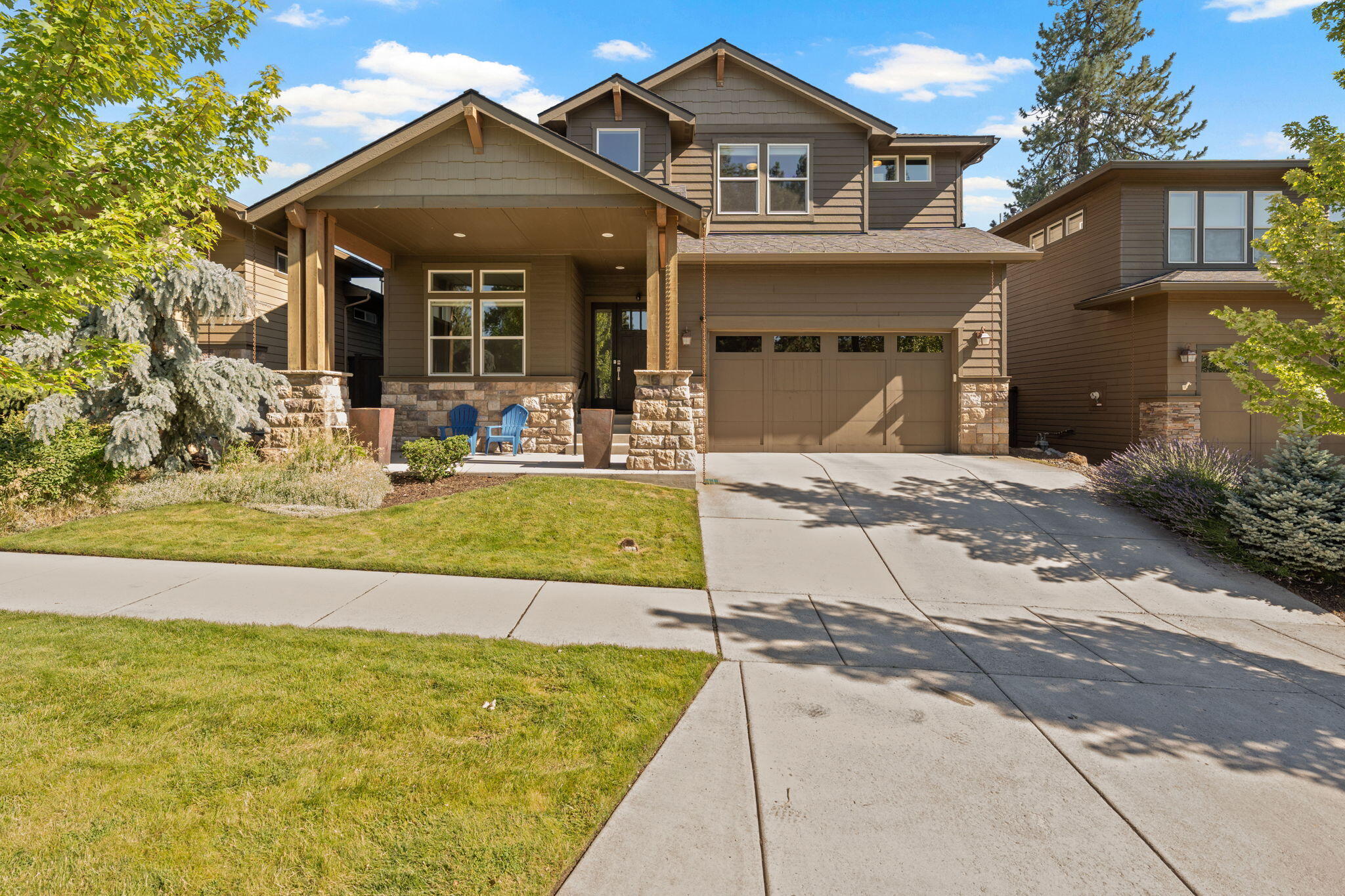 Two Primary Bedrooms. Don't miss the value in this stunning five bedroom SW Bend home with private downstairs office and spacious upstairs loft. Located directly across the street from Aspen Rim's coveted ''Central Park'', which includes a private community pool, covered pavilion with fireplace and wonderful playground. There is additional community common space behind the subject property for added privacy. This home features two spacious primary suites, one downstairs and the other upstairs with the additional three guest bedrooms. The central loft upstairs is a great place to read a book, watch a movie or let the kiddos play. Private office at the downstairs entry boasts glass French doors and beautiful white wainscoting. Oversized 2-car garage, zoned heating/cooling, quartz countertops throughout, built-in speakers and more. HOA covers front yard landscaping. Just a few blocks away from Deschutes river trail access.