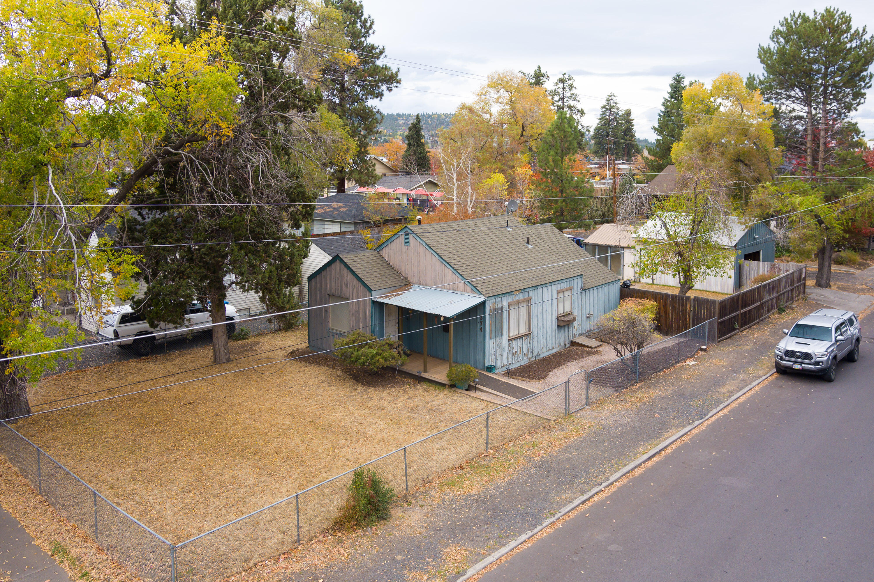 Nicely constructed commercially zoned building on a large lot that is perfectly suited for medical, office, or retail uses. The corner lot is 6,970sf and has alley access in the back behind the shop/garage. The inside of the office space has a large lobby, three private office spaces, and two full bathrooms attached to two separate offices. There is a reception area with a built-in desk and another sink as well. Additionally, there is another office or waiting area between the two back offices. Back & front yards are fully & separately fenced. The shop/garage/storage has power & opener.