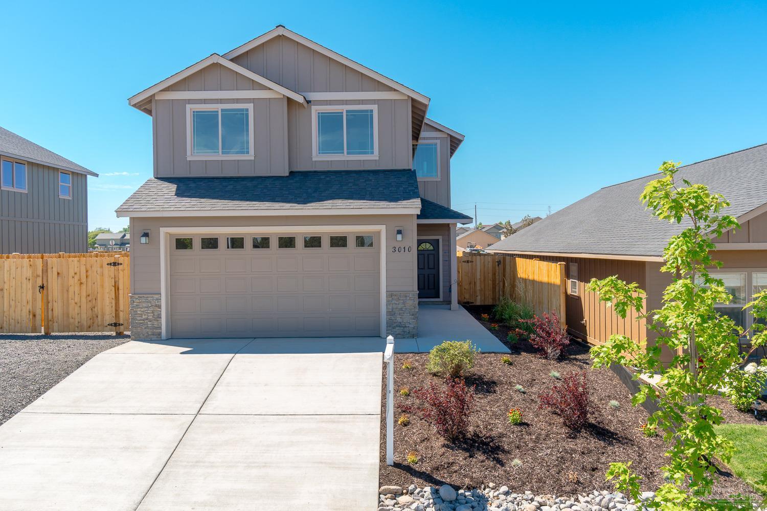 Poplar floor plan in one of Redmond's premier neighborhoods. 3 bedroom, 2.5 bath, 2,111 sf of living space. Spanish oak cabinets, quartz slab counter tops, all stainless appliances. Gas forced air w/high efficiency furnace. Triple, tandem car garage. Front landscaped w/auto sprinklers, fully fenced. Model home located at 3095 NW Alder Place. Open Thurs-Mon 12-5pm