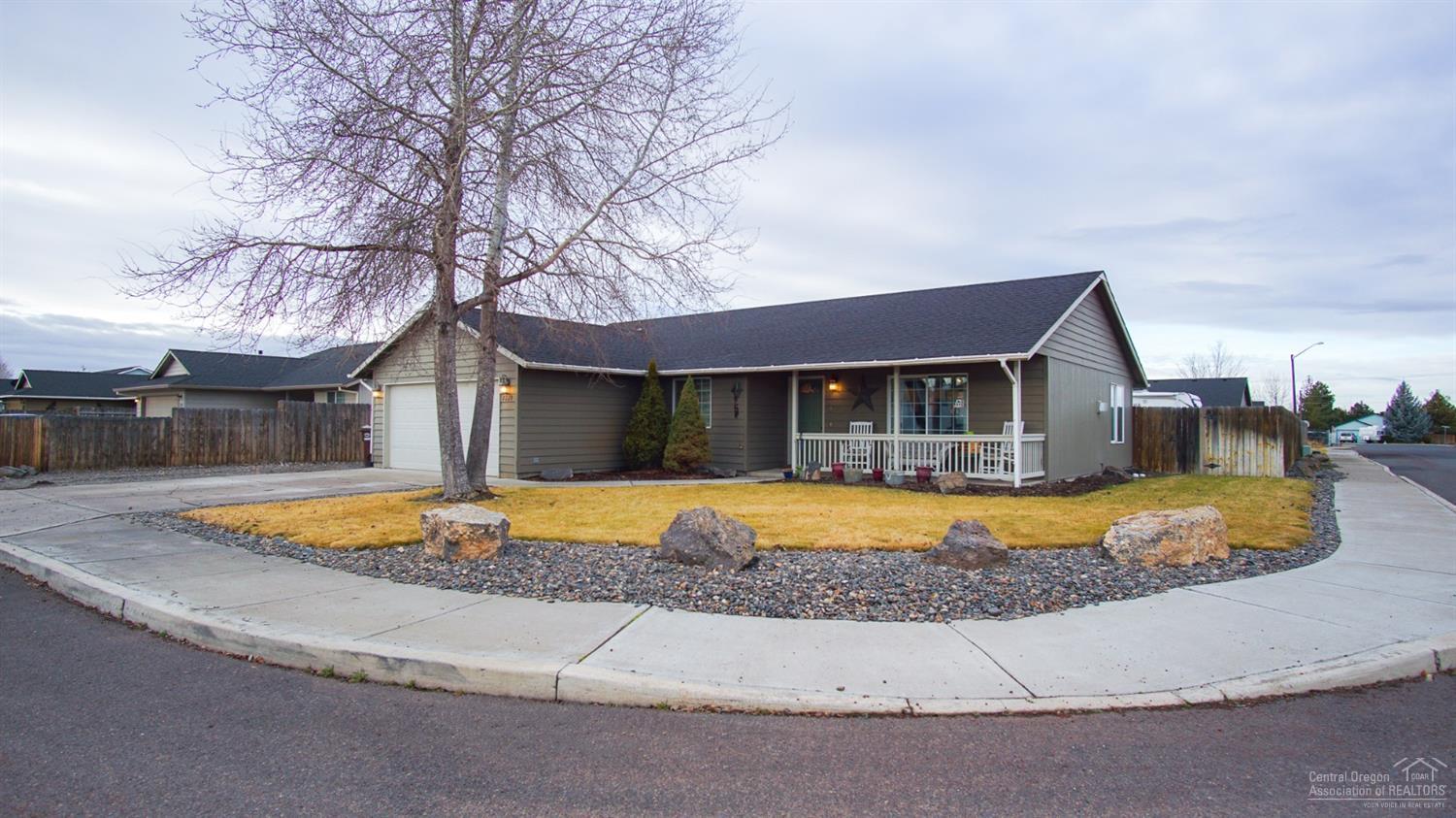 Move-in ready! Where do you find a turn-key 3 bedroom, 2 bath single-level home with vaulted ceilings in the living room, kitchen with breakfast bar and pantry, master with walk-in closet, attached garage with opener and shelving, large fenced yard and room for an RV all on a corner lot? Northridge subdivision in Prineville! New laminate throughout, plumbed for propane heating stove (none currently in the home). Nice rear deck, raised garden beds, shed with loft, graveled RV parking, sprinkler system on a timer all on a corner lot.