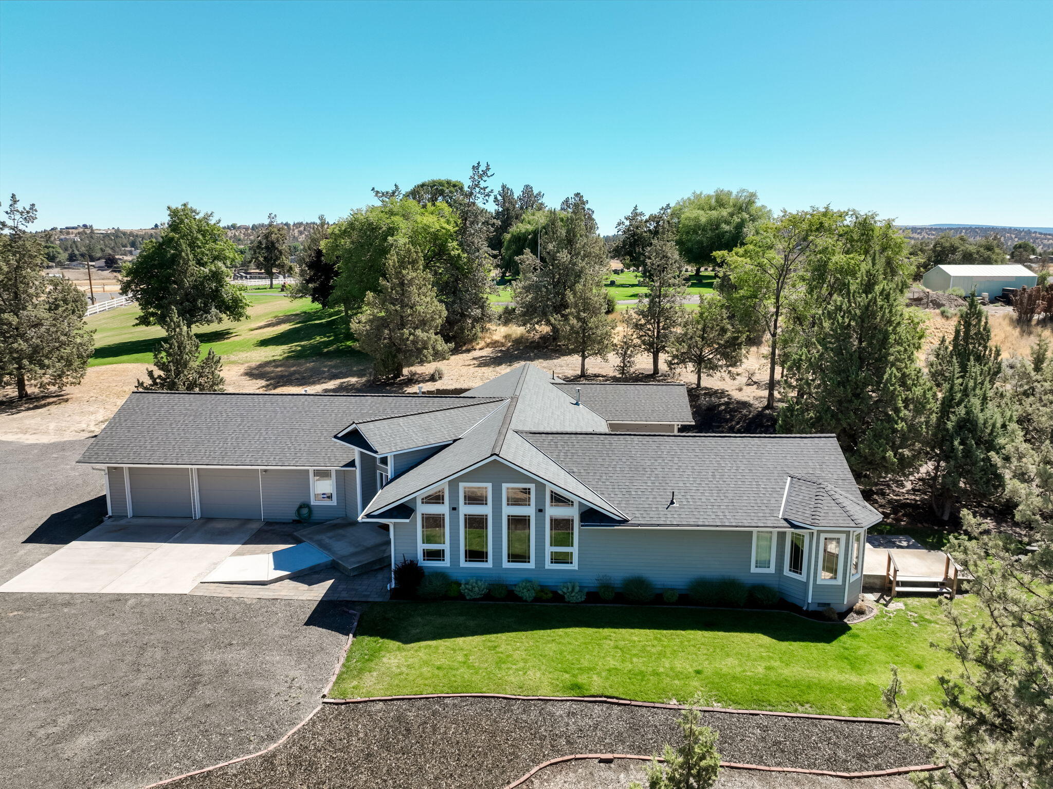 1st time on market! This custom home offers 3 beds, plus office, 3 bath, 2847 SQ ft one-level living with stunning Cascade Mountain views on 4.4 acres. Built in 1994 by the original owner, this home showcases quality craftsmanship and thoughtful design throughout. This property features a spacious great room, formal living room, large laundry/mud room, and a custom primary suite with his/hers closets, and so much more. Quality finishes throughout-wood-wrapped windows, hardwood floors, freestanding gas stove, central vac. Low-maintenance landscaping, new roof in 2024, oversized double garage. No CCRs or HOA restrictions. Plenty of space for boat, RV, and other toys. Peaceful setting just minutes from town - A rare opportunity to own a truly special custom home with views, space, and room to roam -schedule your private showing today!