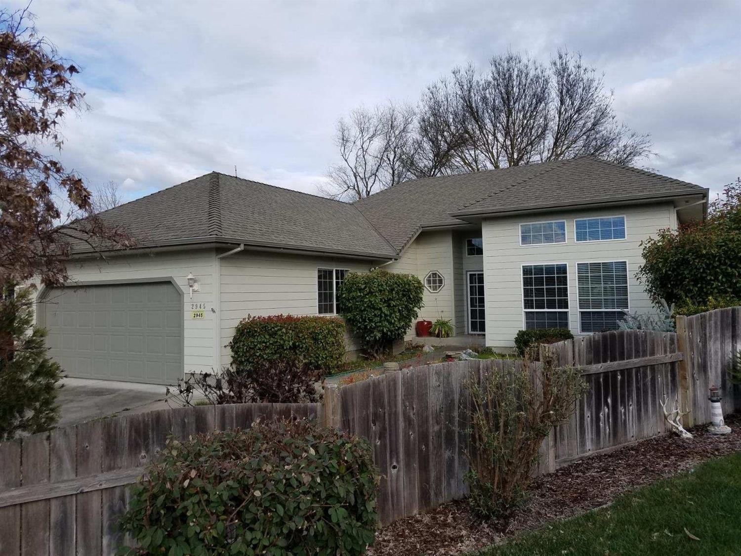 Located on a Quiet cul-de-sac a few miles from GP, but still in Dist 7 schools. This home has many upgrades including vaulted ceilings with oversized windows and 2 skylights for great natural light. Over sized kitchen with custom Oak cabinets and a pantry. Nice sized bedrooms with custom closets throughout. Laundry room with more custom cabinets. Custom cabinets in hallway. Ceiling fans throughout. Lap siding, boxed eaves and an eye catching roof line to show off the extra touches outside. Interior and exterior paint and wood blinds done last yr. Gas central heat and AC with a gas fireplace for an added touch. A deep and finished 2 car garage with additional parking along entire side of house. this home boasts nearly a quarter acre of functional property. Small front yard and a large accessible back and side yard. Close to the Rogue River and boat ramp approx. 1 mile away. Hospital and shopping also close by. Home is owned/occupied by licenced agent.