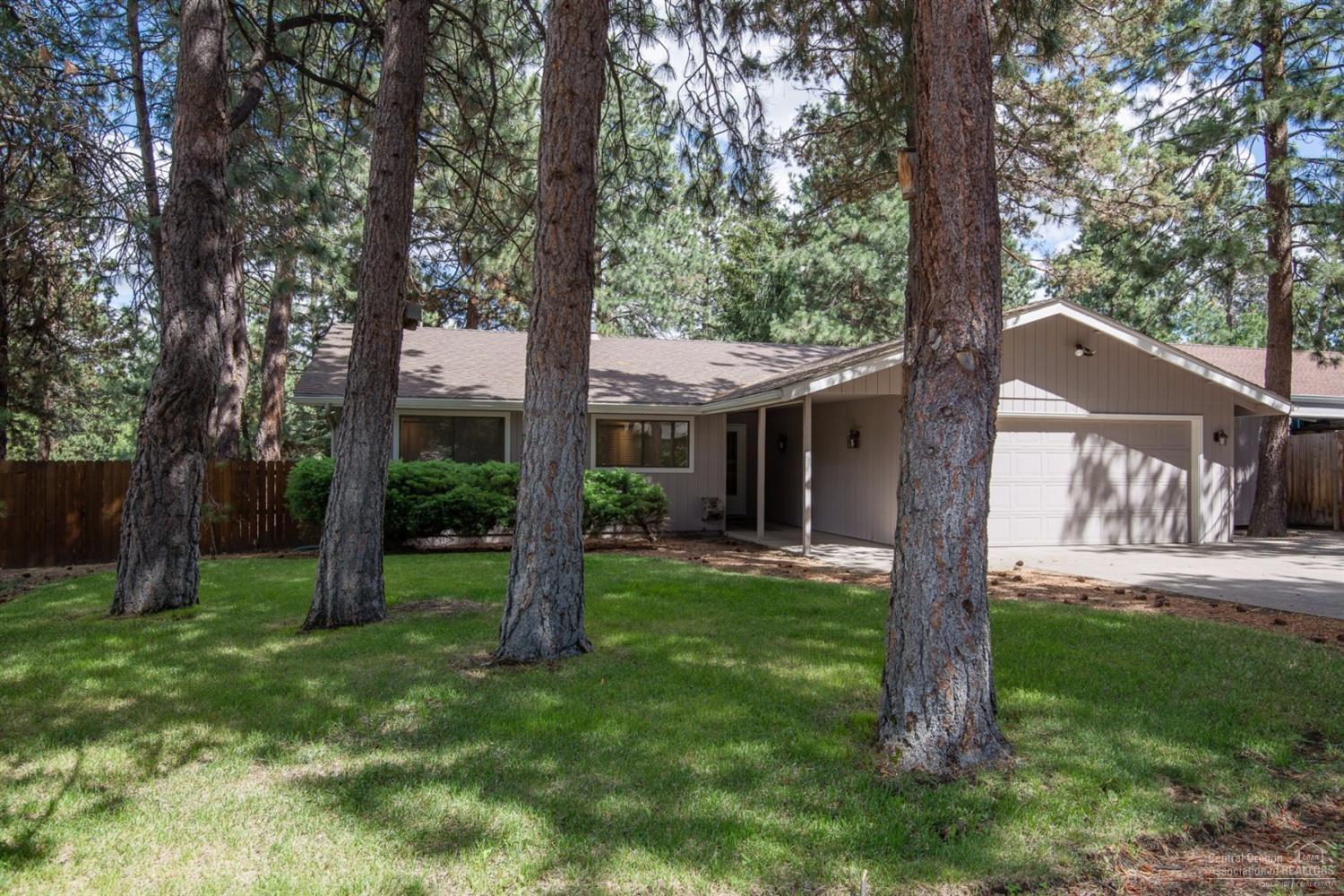 Charming ranch style home on a large private corner lot with common area buffer between neighbors to the back. Fenced yard with mature Ponderosa Pine trees, RV parking, 2 storage sheds, new paint, carpet, septic, furnace A/C, a gas stove in family room and sought after SW location all at an affordable price! All that's left is to move in and add your personal touches. The quiet neighborhood, close to the Old Mill with easy access to the Parkway and Murphy road corridor make this home especially desirable.