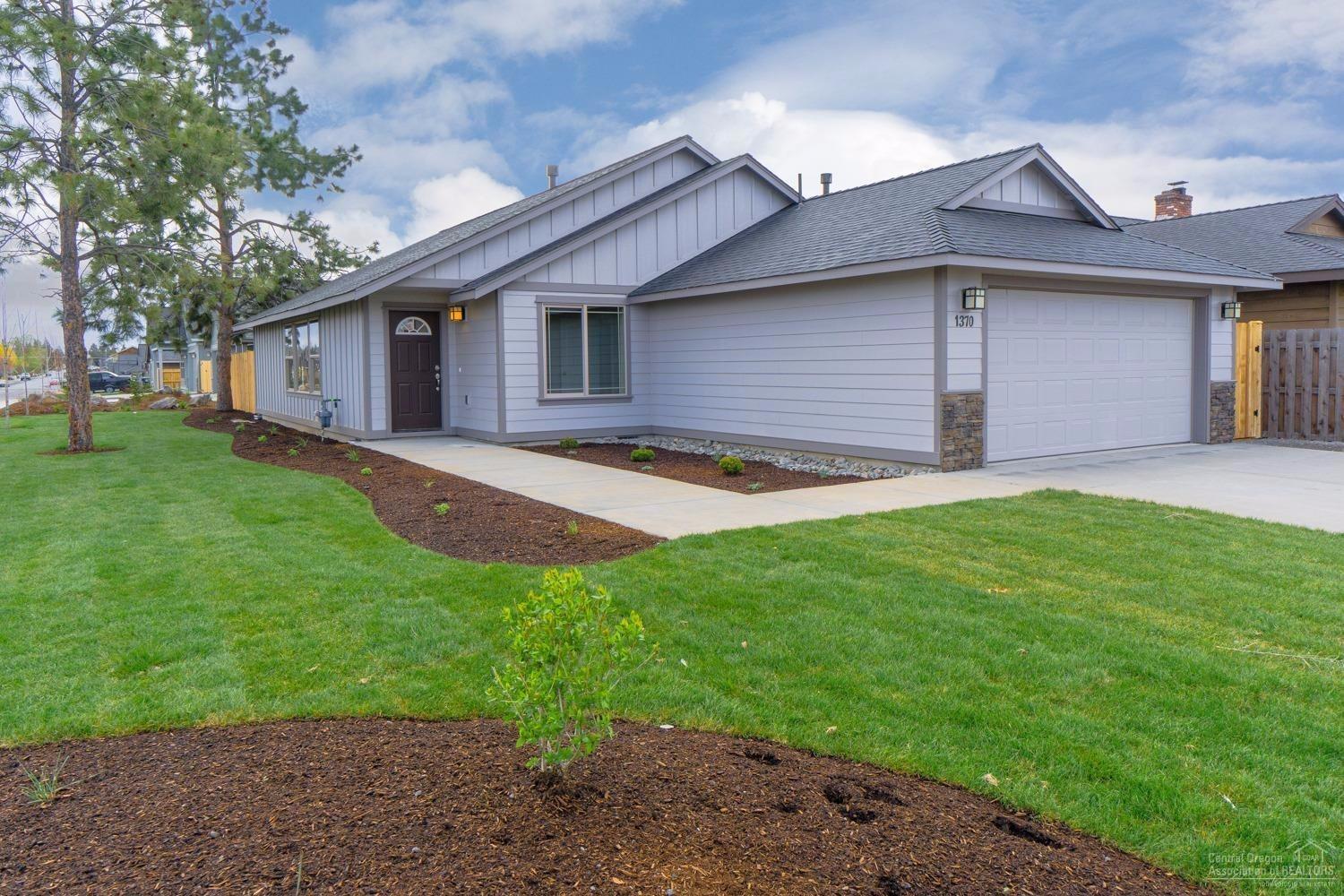 Just completed in NW Redmond's Crane Meadow. 3 bedroom, 2 bath home w/Cascade Mountain views. Vaulted Great Room plan w/huge windows & central Gas Fireplace is open to Kitchen & Dining. Knotty Alder cabinets with Quartz slab counters, glass accent back splash, Stainless appliances. Spacious Master Suite w/dbl sinks in Bath & lg walk in closet. Laundry w/folding table & storage leads to dbl garage. Fully Fenced & Landscaped w/Auto Sprinklers. Model Open Wed-Sun 12-5 pm at corner of NW 19th & NW Larch!