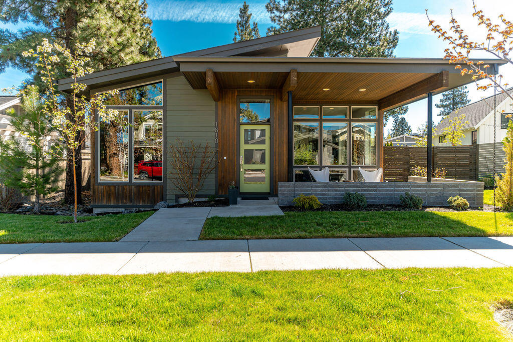 Are you looking for a Northwest Crossing home within walking distance to the Saturday Farmers Market, a dozen restaurants, bakery and wine bar? Look no further than this better than new Mid-Century Modern gem. This home has amazing natural light to show off the 6 inch wide rustic white oak plank floors and quartz countertops. A built in oversized Liebherr refrigerator is included in this gourmet kitchen with pantry space to make any chef happy. Master bath has subway tiled floors and a spacious walk-in shower with built in storage in the walk in closet.  There's 220 electric in the garage with epoxy floors and a 3rd bay that has been turned into a dream workshop. There's even a generator that will run the electrical in the house in case of emergency. Schedule an appointment to see this beauty today!
Open house Friday May 27 and Saturday May 28 from 11:00 to 3:00 pm.