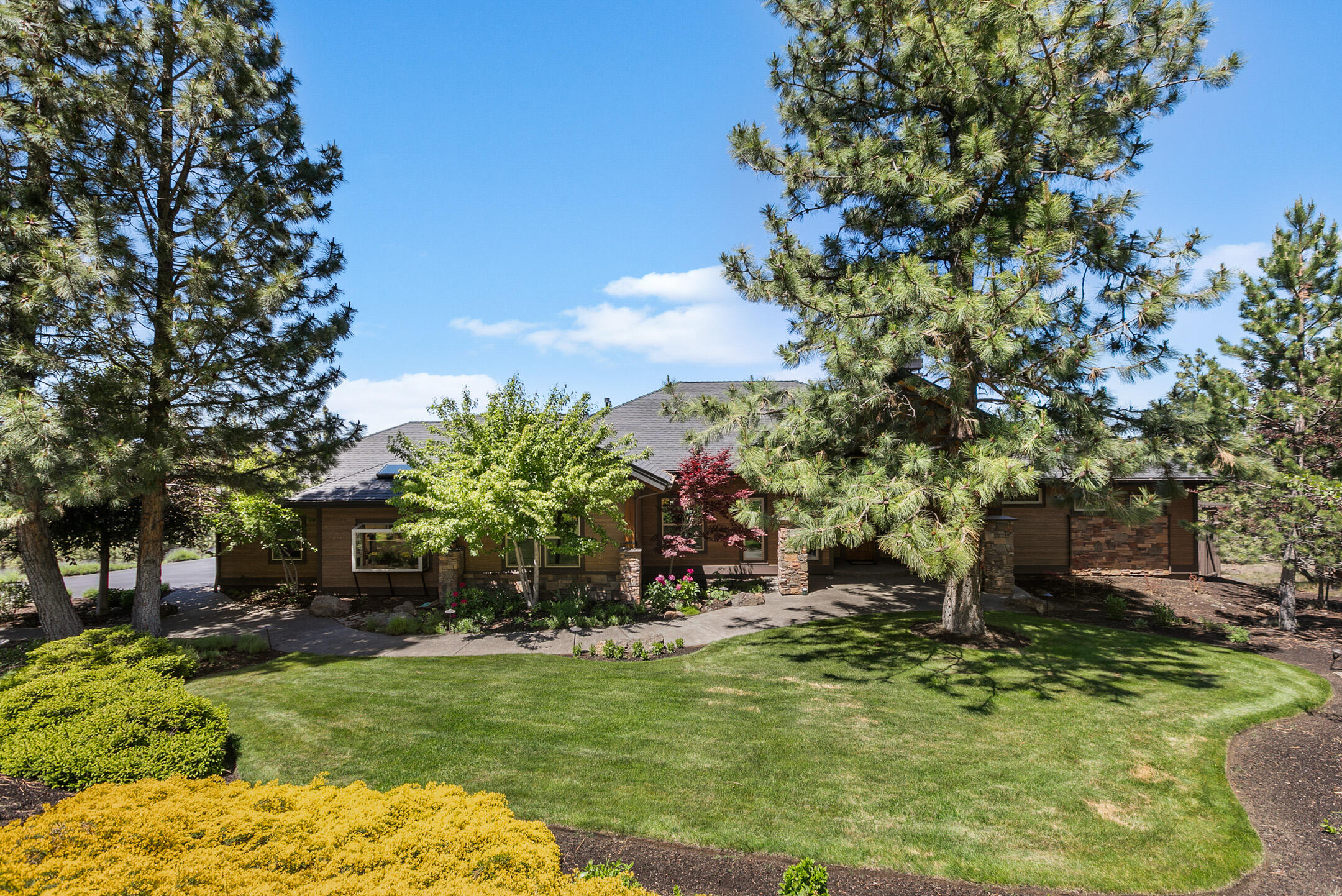 We've got views! Stunning ''take your breath away'' Cascade views from the moment you walk inside the entry way! First time on the market! Original owners birthed the home - and Wow! - Every detail, upgrade and pride of ownership is present. It is picture perfect! Manicured landscaping embraces the home and gorgeous decking to maximize the Cascade views and outdoor living. Easy access driveway and level entry to the main floor. Offering 3,378 sq.ft. with 3 bedrooms, 3 full bathrooms, 2 offices, media room, large bonus game room (could be 2nd family room), wine storage room.  Main floor with great room living, high ceilings, gourmet kitchen, Brazilian Cherrywood flooring and cabinetry, private master retreat, shower with dual heads for full body and private sundeck, 2nd bedroom-bath, office, laundry, garage access and indoor green house.  Lower level with 3rd bedroom-bath, office, media room, large game room, and wine storage. So many features to list – must come see for yourself!