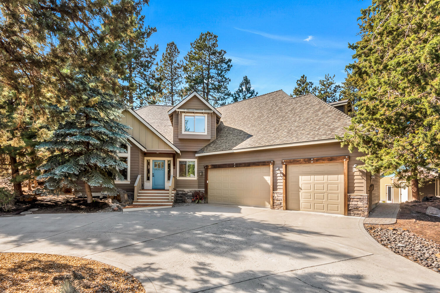 You will not want to miss this private and elegant custom home located just blocks from the Old Mill District, Deschutes river trails and parks. The authentic and custom features throughout this home are nothing short of stunning. Two fireplaces, one with Rift sawn, white oak that has been fumed to bring out the grain and colors, while the great room fireplace features a blue stone hearth and a mantel that was harvested from a Central Oregon barn built in 1892. There are additional Barnwood trim and finishes throughout including white washed wood from an old milking parlor. Most recent updates include; fresh interior paint, new roof, refinished decks and a 24'x32' detached shop that is insulated, finished and heated; a perfect home office, yoga studio, game room, etc. Let's not forget the property is private and nearly 3/4 of an acre. There may be an opportunity in the future to split this lot into additional parcels or just keep it all as your own private Bend sanctuary.