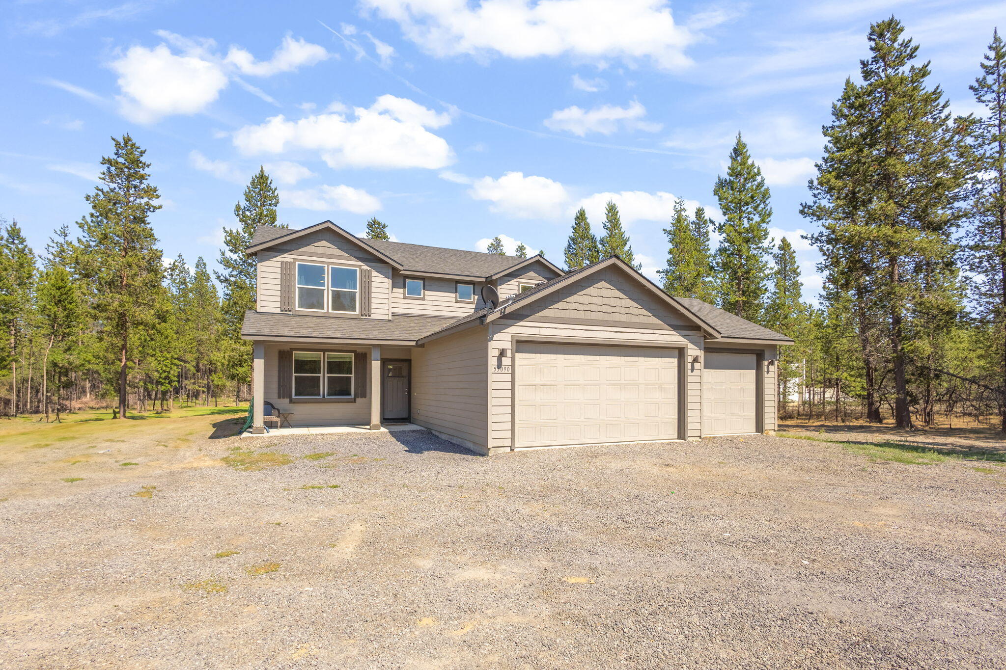 Welcome to this stunning 2-story home built in 2018, where modern comfort meets spacious outdoor living. Beautifully maintained and thoughtfully designed, this home features 4 generous bedrooms and 2.5 bathrooms. The open layout boasts soaring ceilings and an abundance of natural light, creating a warm and inviting atmosphere perfect for both daily living and entertaining. Enjoy the convenience of a large 3-car garage, providing ample space for vehicles, storage, toys, or a workshop.

Set on 2 fully fenced acres, the property offers privacy, space to spread out, and endless possibilities for gardening or building an additional large shop. The house is set back on the property for ultimate privacy, with potential for a beautifully landscaped and expansive front yard. A small paver patio in the backyard provides a perfect spot to relax or entertain outdoors. Enjoy peaceful living with all the benefits of modern construction. Short drive to lakes, rivers, and mountains.