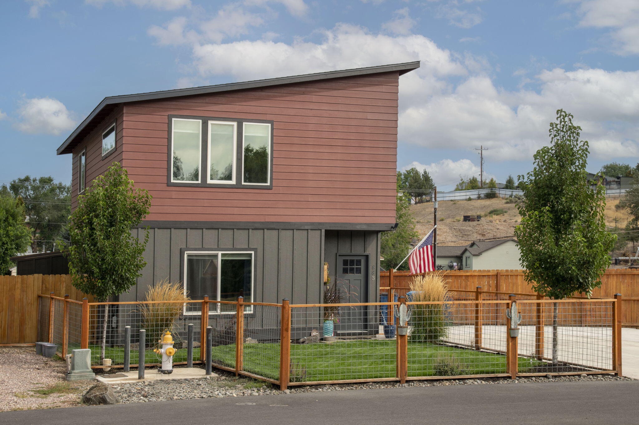 Welcome to this charming 2-bedroom, 2.5-bath home offering 1,099 sqft of thoughtfully designed living space. Ideally located directly across from Ochoco Creek Park, enjoy easy access to walking trails, basketball courts and the popular bike park right outside your front door. Step inside to discover an open and inviting floor plan featuring 9' ceilings, durable LVP plank flooring and a modern kitchen complete with granite countertops and stainless steel appliances. Upstairs, the primary suite features its own private bathroom, while the second bedroom has a full bathroom just steps away, ideal for guests or roommates. Outside, the fully fenced front yard is beautifully landscaped and equipped with in-ground sprinklers for easy maintenance. Additional highlights include an extended concrete parking area and a convenient storage shed in the backyard. Whether you're looking for low-maintenance living or a peaceful place to call home near outdoor recreation, this one checks all the boxes!