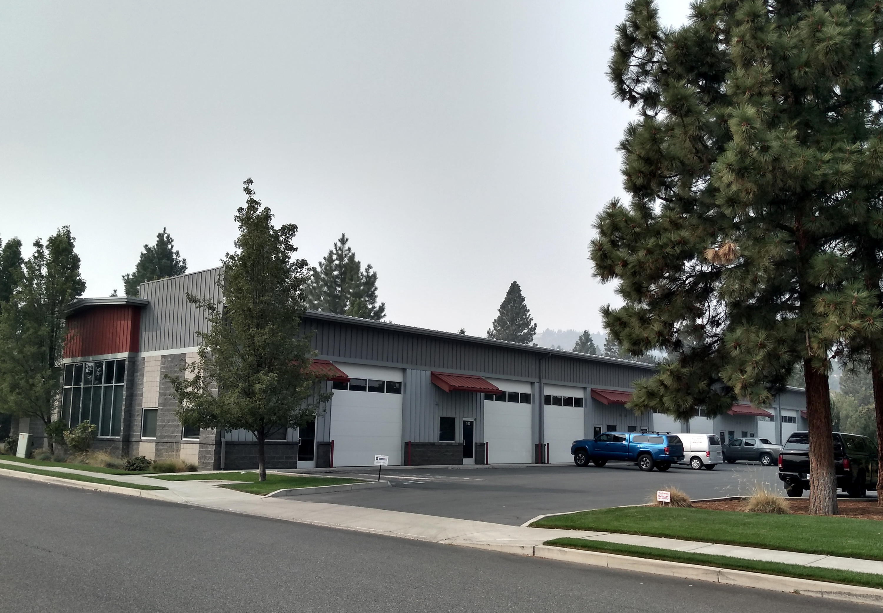 Available immediately. This 2212 SF space is in excellent condition on Bend's north end on the corner of Crusher and Archie Briggs. This unit features an office (approx. 10 ft x 15 ft), a 14 ft roll up door with an automatic opener and an open warehouse space with high ceilings with high output shop light fixtures. The unit also has 150 amp, 3 phase power, wet fire sprinkler system, as well as two large ceiling fans that help circulate the heat/air. Call to schedule your tour today.