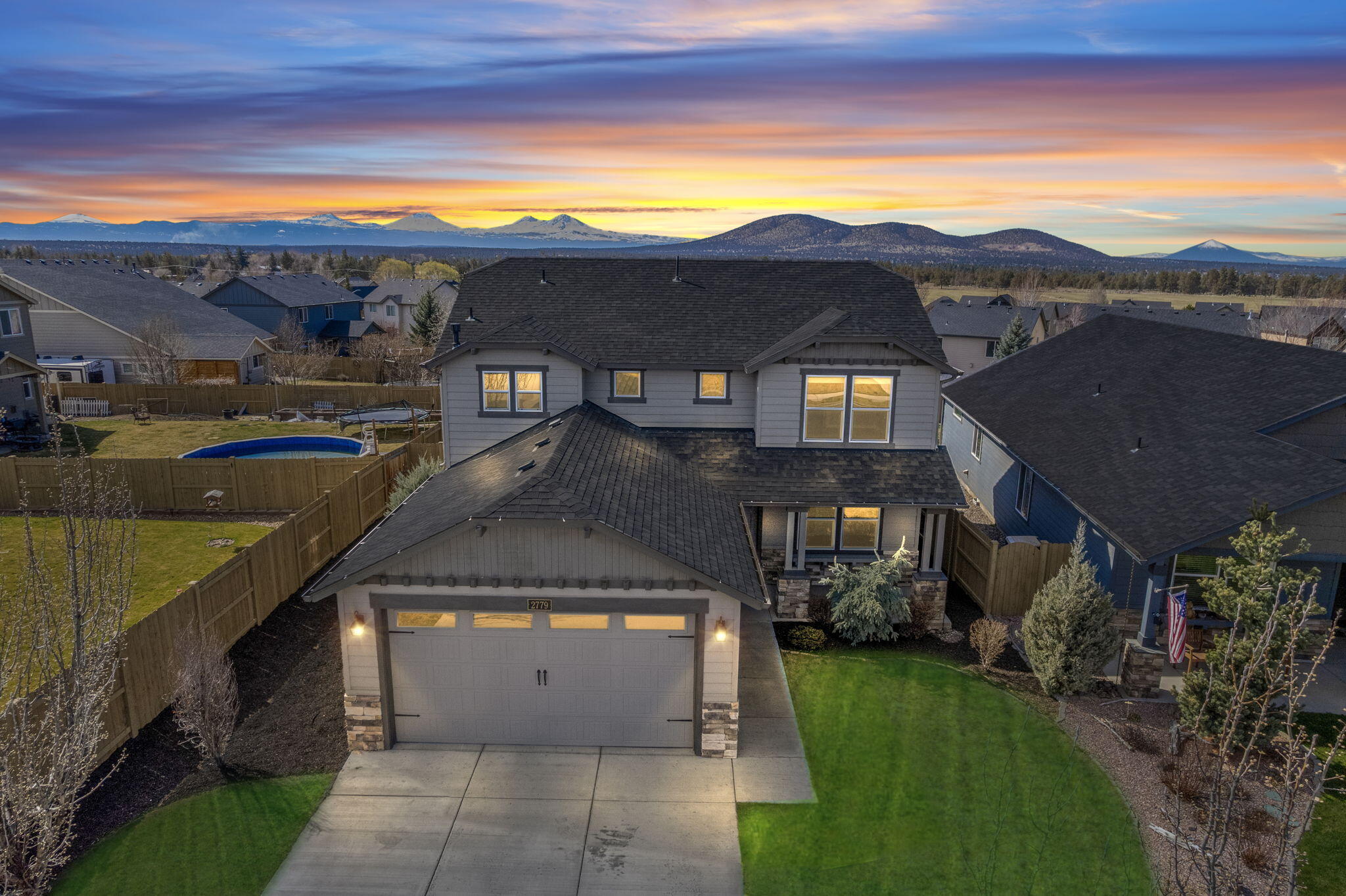 Enjoy stunning Cascade Mountain views from nearly every corner of this freshly updated Summit Crest home. The generously sized, west-facing backyard is fully fenced and offers a covered patio with a gas hookup, perfect for outdoor entertaining while soaking in the scenery. Inside, the great room shines with brand-new flooring, new light fixture, brand new high-end stainless steel appliances, and fresh interior paint. A main-floor bedroom and full bath provide flexibility for multigenerational living, guests, or a home office. Upstairs there is new high end carpet. The primary suite features a luxurious five-piece bath and a spacious walk-in closet, with two additional bedrooms and a dedicated laundry room nearby for added convenience. Enjoy an extended garage for your toys. Plus, you're just steps away from the Summit Crest neighborhood park and playground. This well-established neighborhood offers a prime location; only minutes from downtown Redmond and 15 minutes to Bend.