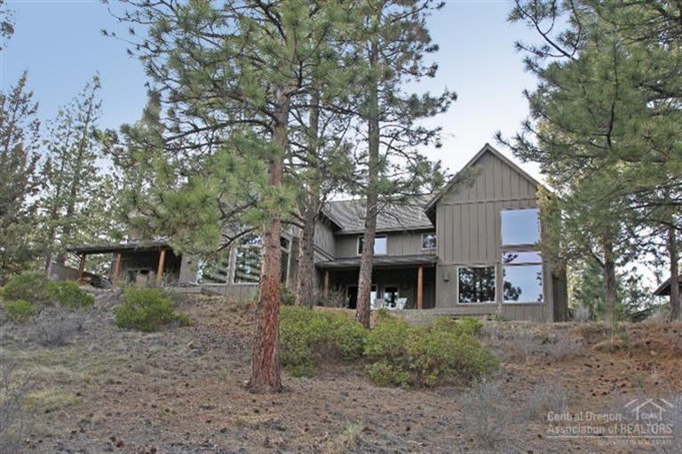 The perfect setting amidst the Ponderosa Pines w/expansive views of the Deschutes River and Canyon. This No Care Townhome is 2 bedroom, (Loft could easily be converted into a 3rd bedroom) 2.5 bath with a 25' vaulted ceiling great room; master on the main level and solid core knotty alder woodwork throughout. Kitchen features slab granite,bamboo floors and stainless steel appliances. Trex deck overlooking the peaceful and private river setting. All within steps to the Deschutes River hiking trail! One owner