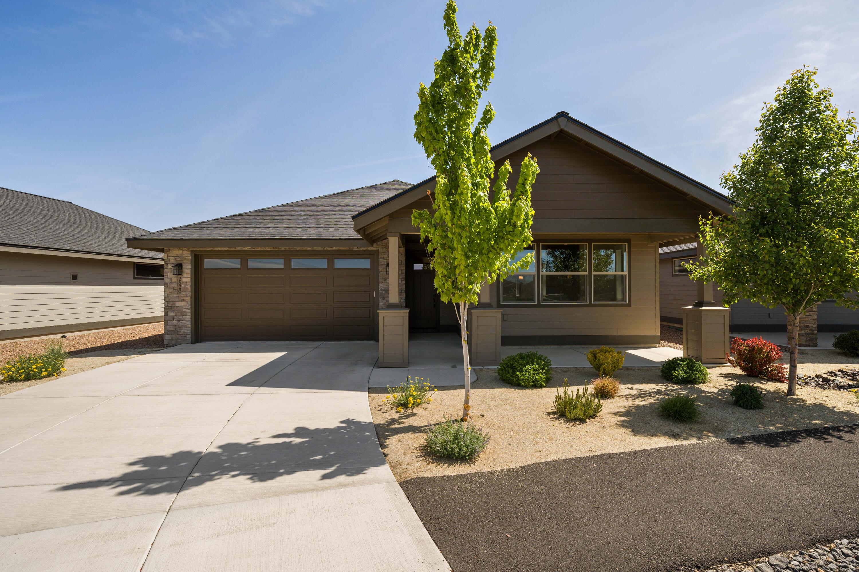 Limited-time incentive! Seller is offering up to $5,000 in credits toward buyer closing costs and prepaids with an acceptable offer received before December 31st!  

Beautifully designed and move-in ready! This warm, inviting home offers an open layout with a cozy gas fireplace and bright breakfast nook. Gourmet kitchen with quartz counters, stainless appliances, and ample storage. Spacious primary suite and covered patio for outdoor relaxation. Located in a 55+ gated community with a new clubhouse under construction featuring an indoor pool, pickleball, gym, bocce ball, and second floor observation deck. Close to trails, golf, dining, and shopping.