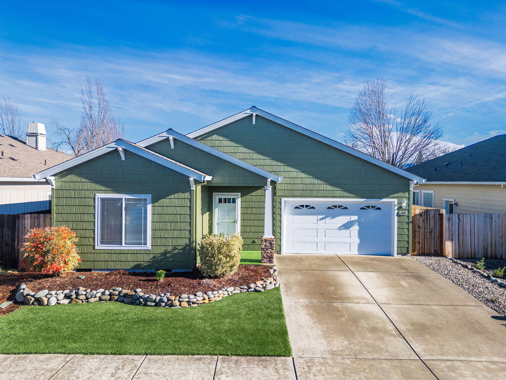 Tucked away in a quiet Central Point neighborhood, this spacious 1,602 SF, 3-bedroom, 2-bath home offers comfort, convenience, and room to breathe. High ceilings create an open, airy feel, while a thoughtful mix of laminate and carpet flooring adds both durability and warmth. The backyard features brand-new sod—perfect for play, pets, or relaxing—along with a covered back patio ideal for morning coffee or evening unwinding. With generous living space and a welcoming layout, this home is designed for everyday living and easy entertaining. Enjoy a great community feel with quick access to Medford, plus close proximity to new restaurants, shopping, and coffee shops. This is Central Point living at its best.