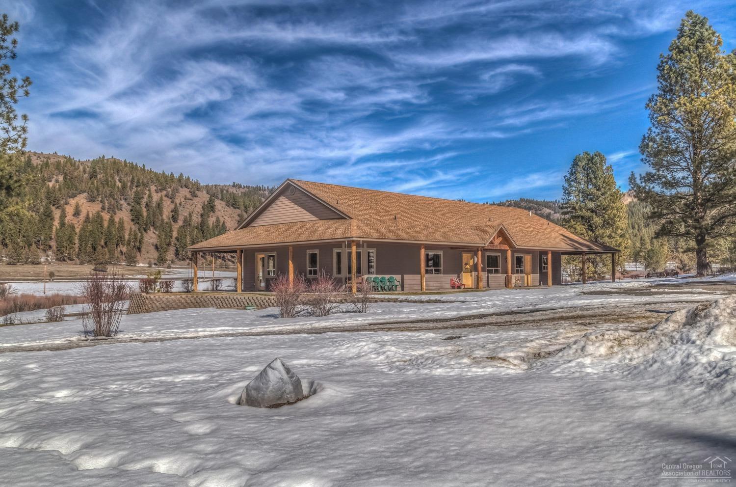 The Old Wolf Creek Ranch is where the outdoor lifestyle blends perfectly with luxury living and proximity. Located 15 miles from the city of Prineville, OR the Old Wolf Creek Ranch boasts 478 deeded and contiguous acres and is nestled up against the mountains of Central Oregon. The home is an impeccably built 3570sf single level ranch style home. The home has 3 bedrooms W/ 2 masters, office and a beautifully crafted kitchen. The barn is 40'x80' with 7 stalls and a heated tack room. Land is Perimeter fenced.