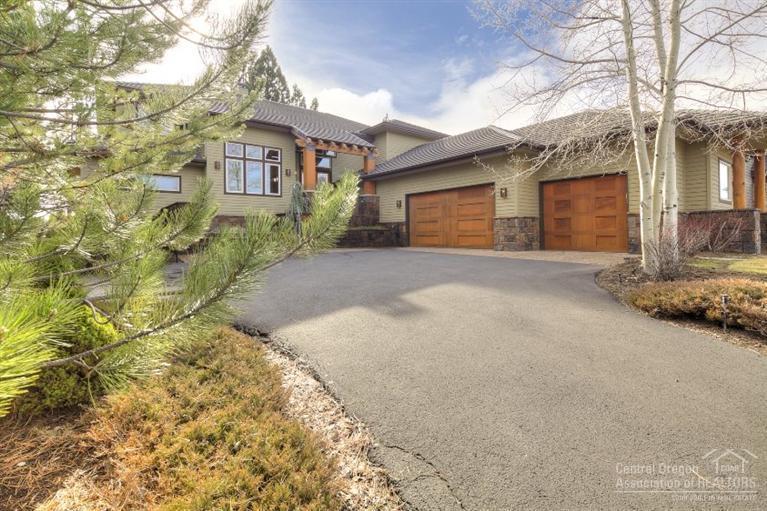 Enjoy stunning views of the Cascade Mountains & Broken Top golf course views from this home overlooking the 13th teebox & fairway. Both comfortable & elegant, the home features an open great room w/lots of windows, wood flooring & high wood paneled ceilings. Delightful den, spacious kitchen, 2 built-in bars, 3 fireplaces & 2nd master suite down. Expansive deck partially covered & faces south & west. Great laundry/mudroom & oversized 3-car garage provides lots of storage. Gated community close to everything.