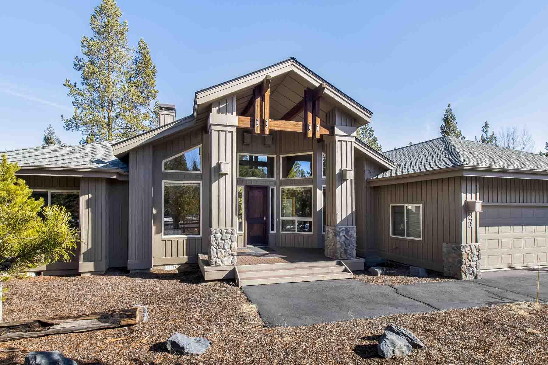 Escape to luxury and comfort in this stunning 4-bedroom plus office or 5th sleeping area, single-level lodge-style home in the picturesque community of Sunriver. Immerse yourself in the peaceful surroundings of this beautiful home, featuring two suites on opposing sides of the home, both with access to the back deck/paver patio area. With high ceilings, warm knotty pine log accents and paneling, and cozy stone fireplace, you'll feel right at home from the moment you arrive. This home is perfect for families or groups seeking a relaxed, stress-free getaway in a stunning natural setting. Come see for yourself why this lodge-style home in Sunriver is the perfect place to escape from the hustle and bustle of everyday life. Soak in the hot tub after a day on the slopes. Many newer upgrades including roof, most appliances, furnace, A/C, hot tub, paver patio, Trex front & back deck, carpet, exterior paint. SHARC Paid in Full.