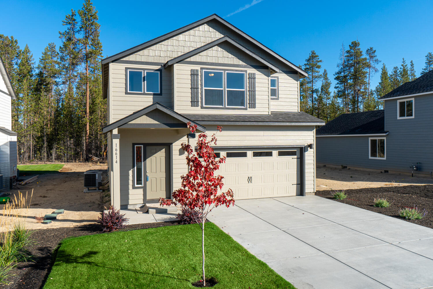 Don't miss this charming home located in the heart of Central Oregon, close to town for shopping + services & still just min from Class A fishing, skiing & all the wonderful recreation Central Oregon is famous for. You'll find craftsmanship throughout this two-story home w/great room floorplan ftr cozy gas fp w/mantle, & tons of natural light w/energy efficient windows throughout.  Kitchen boasts stainless steel appliances, solid surface counters, full height designer backsplash, an abundance of cabinet space, central island w/brkfst bar seating, large eating area plus a built-in desk area off the kitchen. Luxury vinyl plank flooring throughout all main living areas plus carpeted bedrooms. Spacious primary suite ftrs large walkin closet w/built-ins, spacious ensuite bath w/ step-in shower, dual vanities, & enclosed toilet area. Two other guest bedrooms share full bath w/shower/tub combo. Laundry room w/built-ins + sink, covered front entry, front landscaping w/sprinklers, 2 car garage!