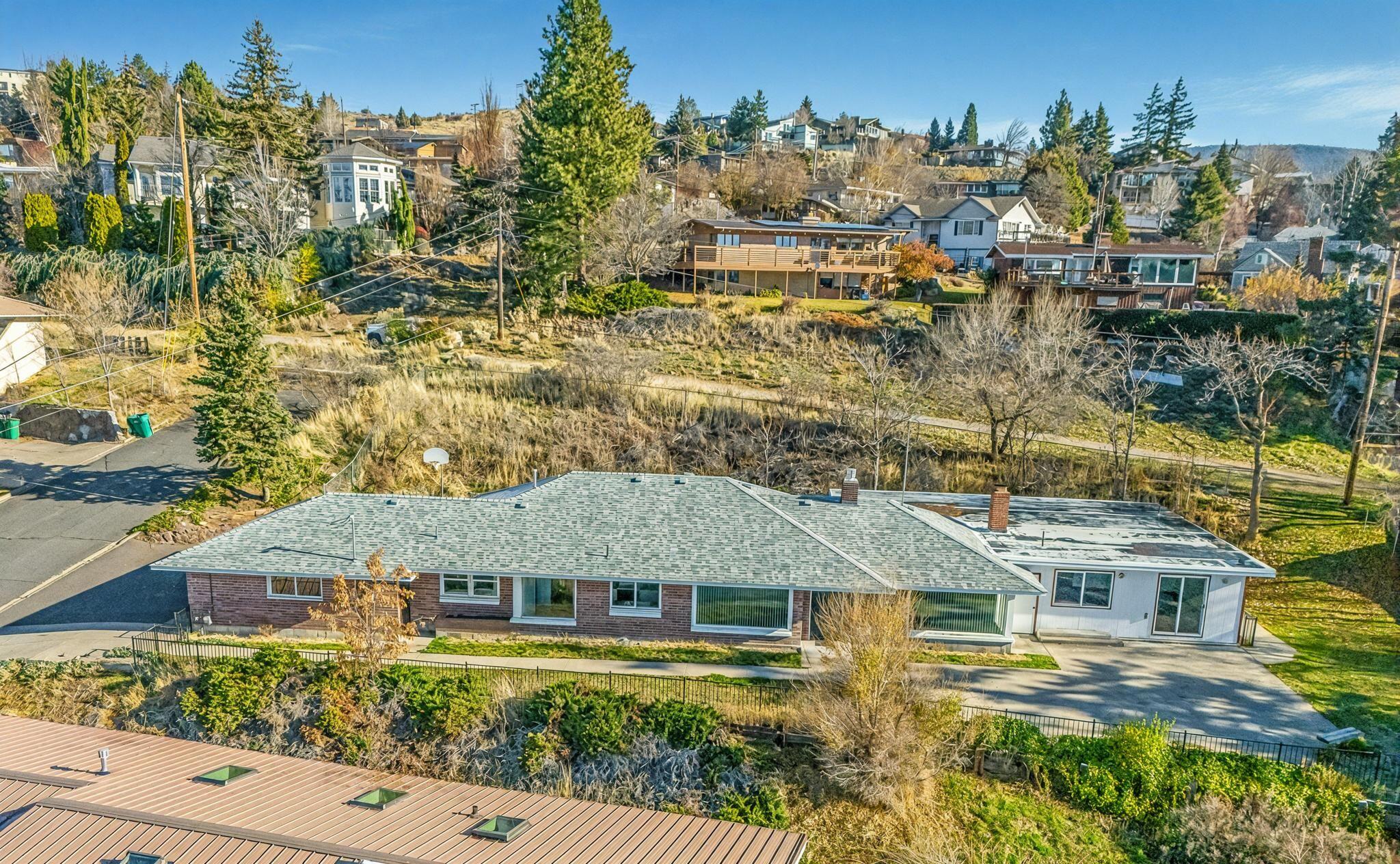 Nice 4-bedroom (2 primary) 3-bath home off Pacific Terrace with 2,833 sq ft of living space. Enjoy beautiful Klamath Basin views from a large patio and multiple rooms. Spacious rooms and a floor plan ideal for families and entertaining. Close to schools, shopping, and hospital for an easy daily life. Good-sized attached garage.  Schedule a tour today and experience the views and space for yourself.