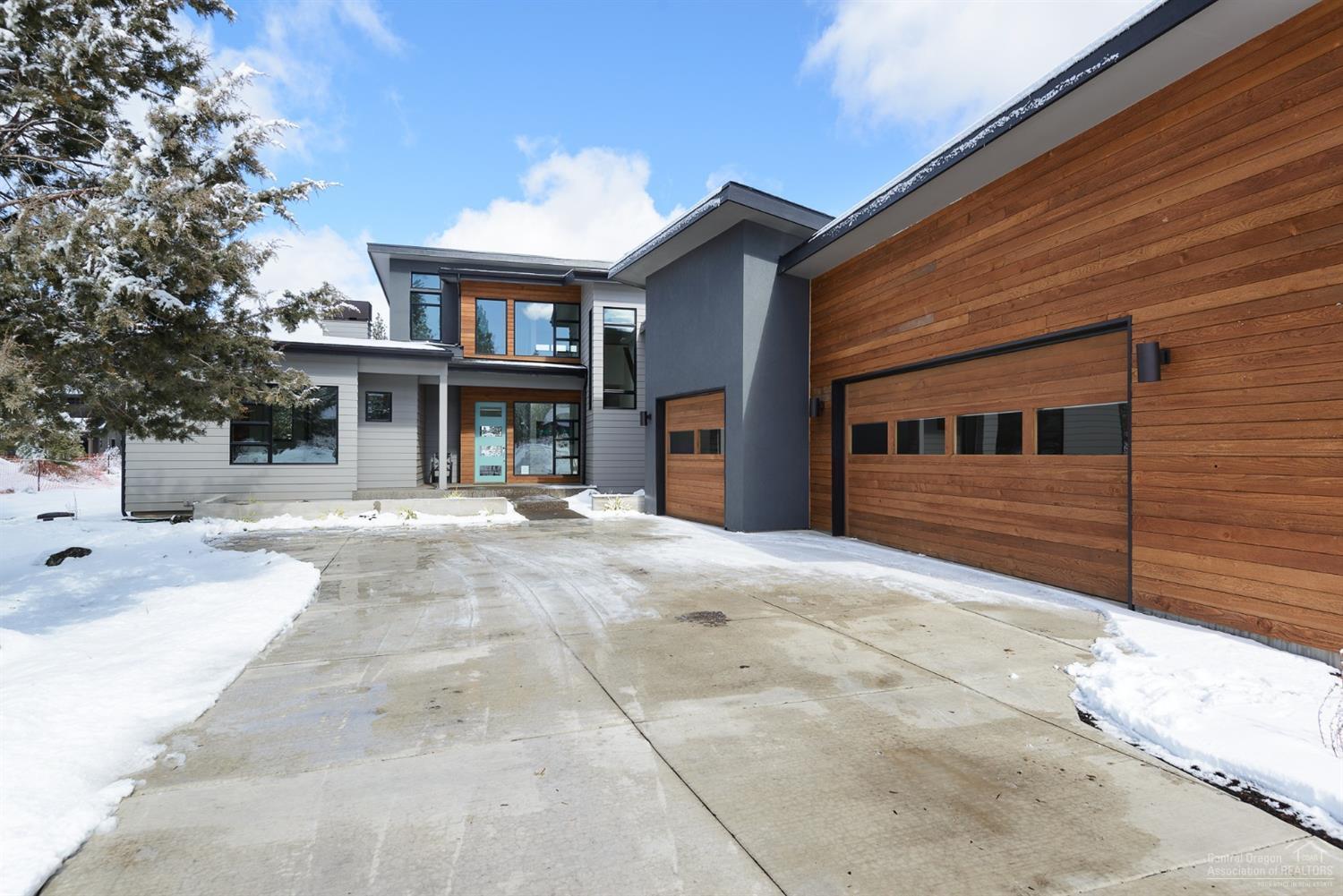 Construction is complete! This showpiece home built by cutting edge firm Dream Home Building and Design is Potential Net Zero using the latest building science technology and materials - this healthy, comfortable, durable, efficient, and beautiful home will amaze with the large chef's kitchen, spacious great room, luxurious master on main, guest suite/office as well as 2 bedrooms, bonus room, and garden deck on 2nd level. Oversize 3 car garage. Golf membership included.